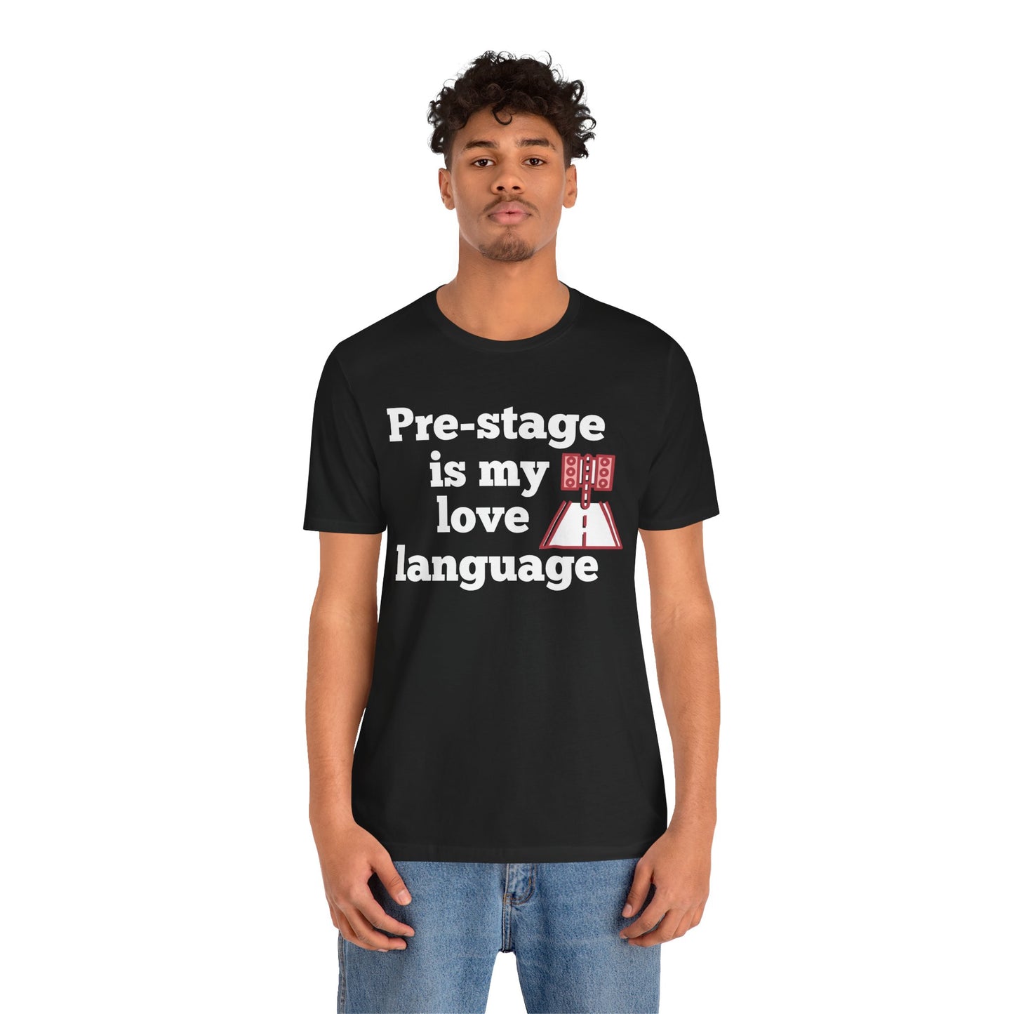 Person wearing a black t-shirt with text 'Snooze button is my love language' and a graphic design on a white background