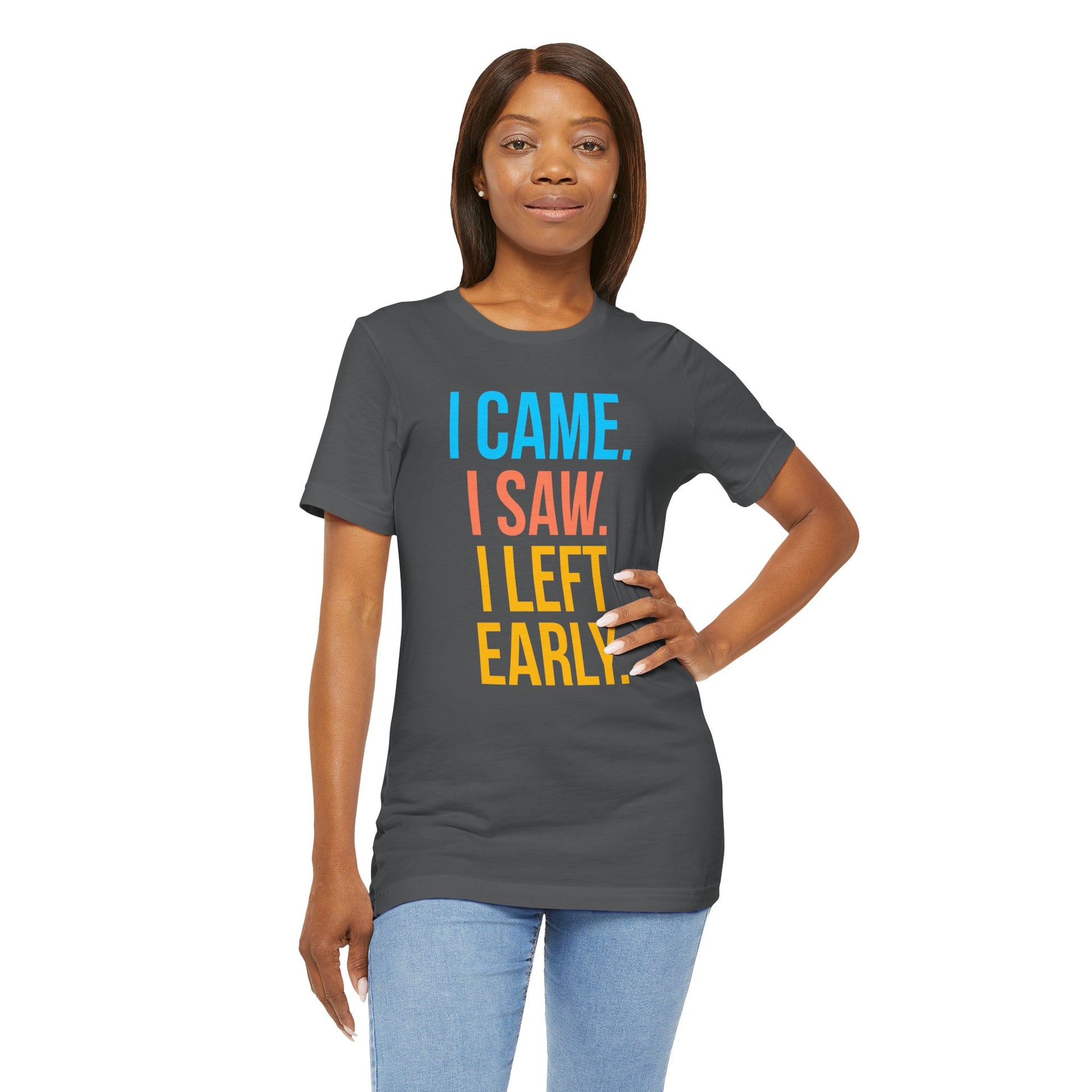 Woman wearing a gray t-shirt with colorful text 'I CAME. I SAW. I LEFT EARLY.' on a white background