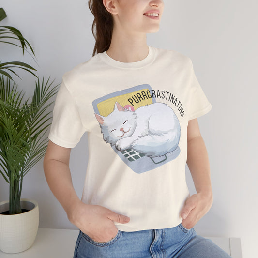 Person wearing a white t-shirt with a cat graphic and text 'Purrcrastinating', standing against a plain background.