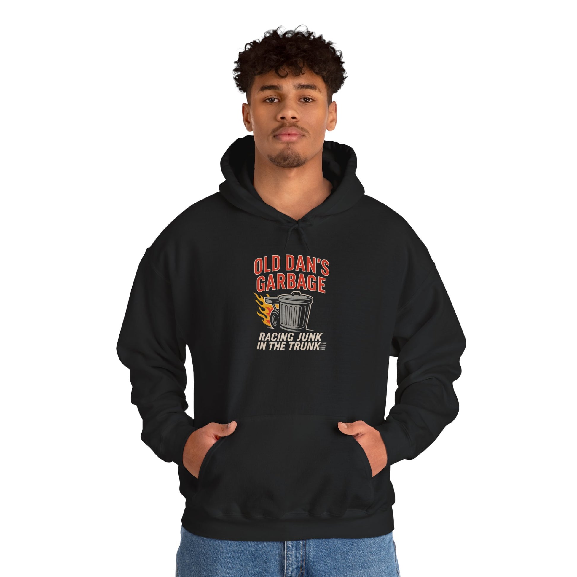Person wearing a black hoodie with graphic design and text Old Dan's Garbage Racing Junk In The Trunk on a white background