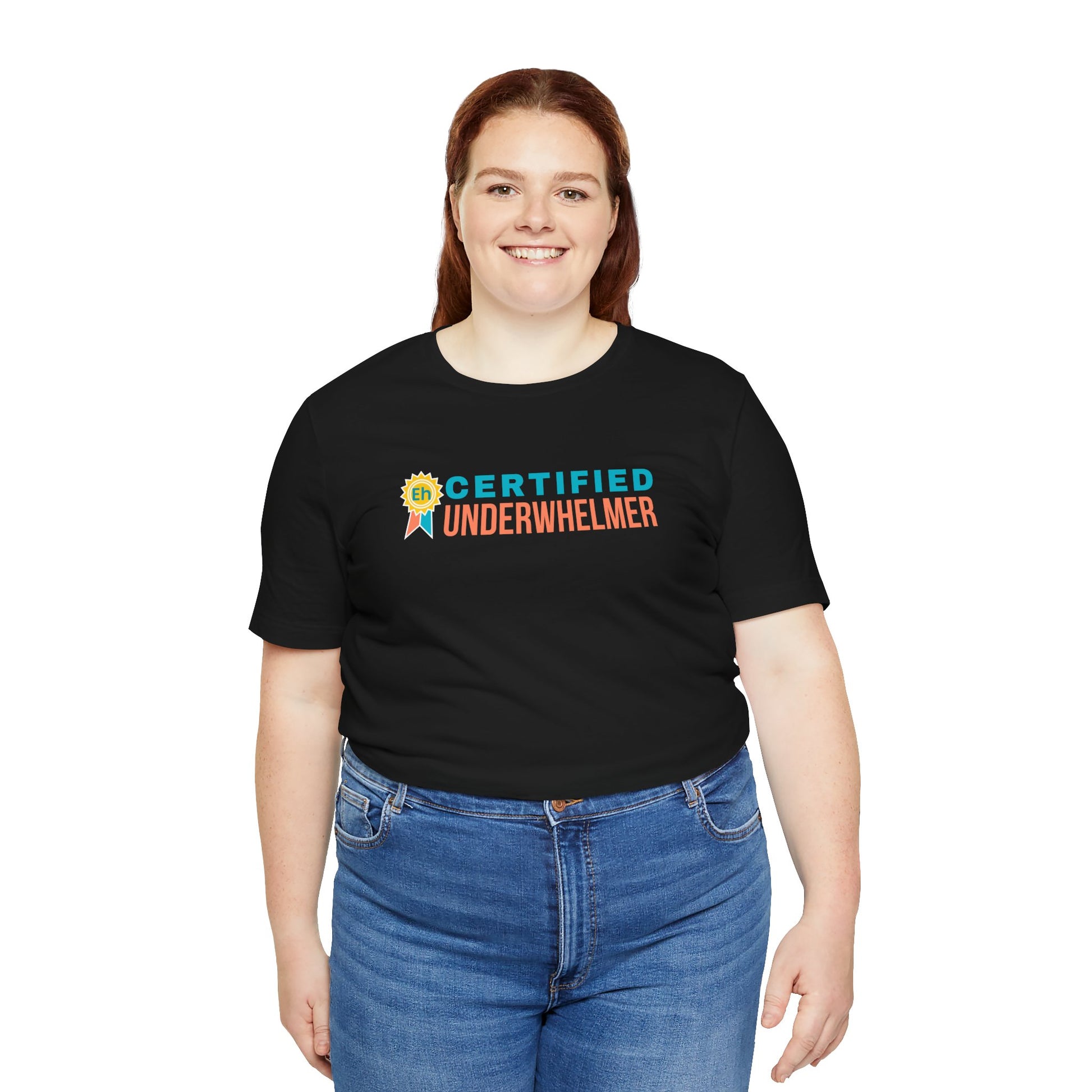 Person wearing a black t-shirt with 'Certified Underwhelmer' text on a white background