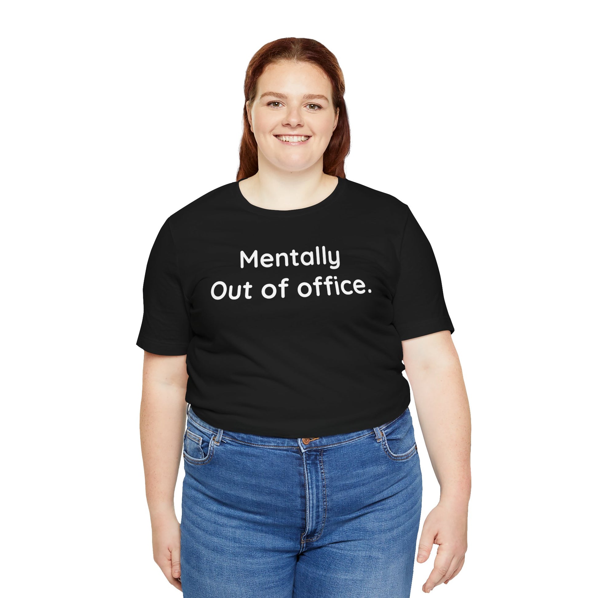 Person wearing a black t-shirt with 'Mentally Out of Office' text on a white background