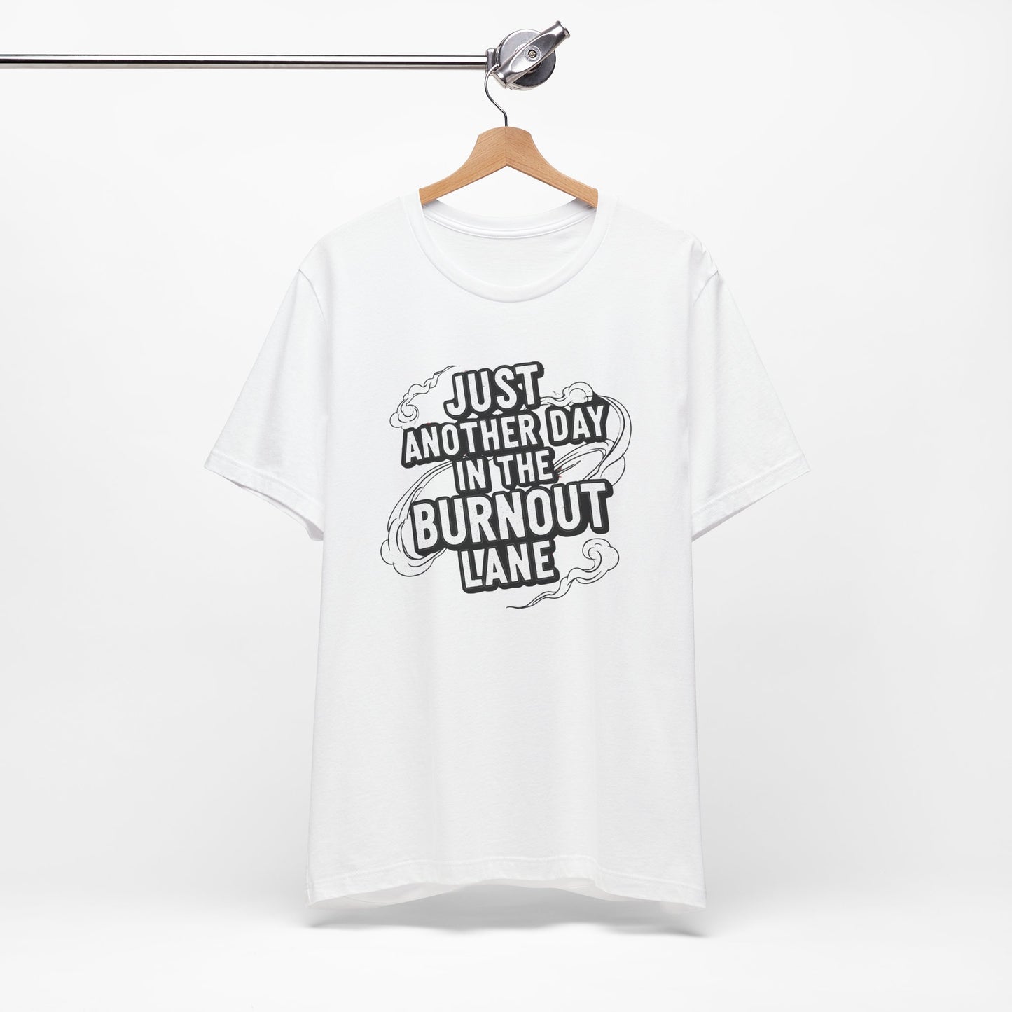 White t-shirt with black text on a hanger against a white background