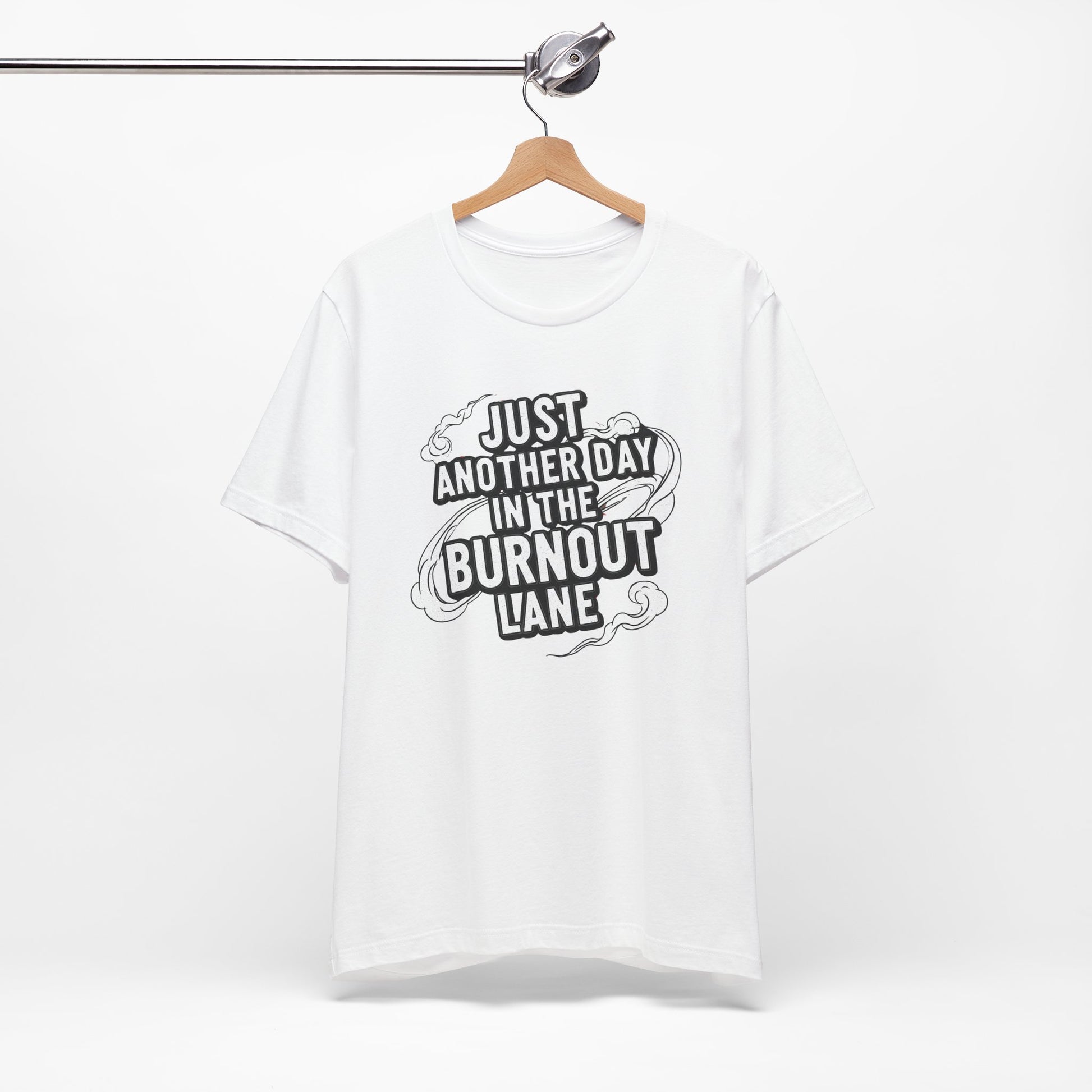 White t-shirt with black text on a hanger against a white background
