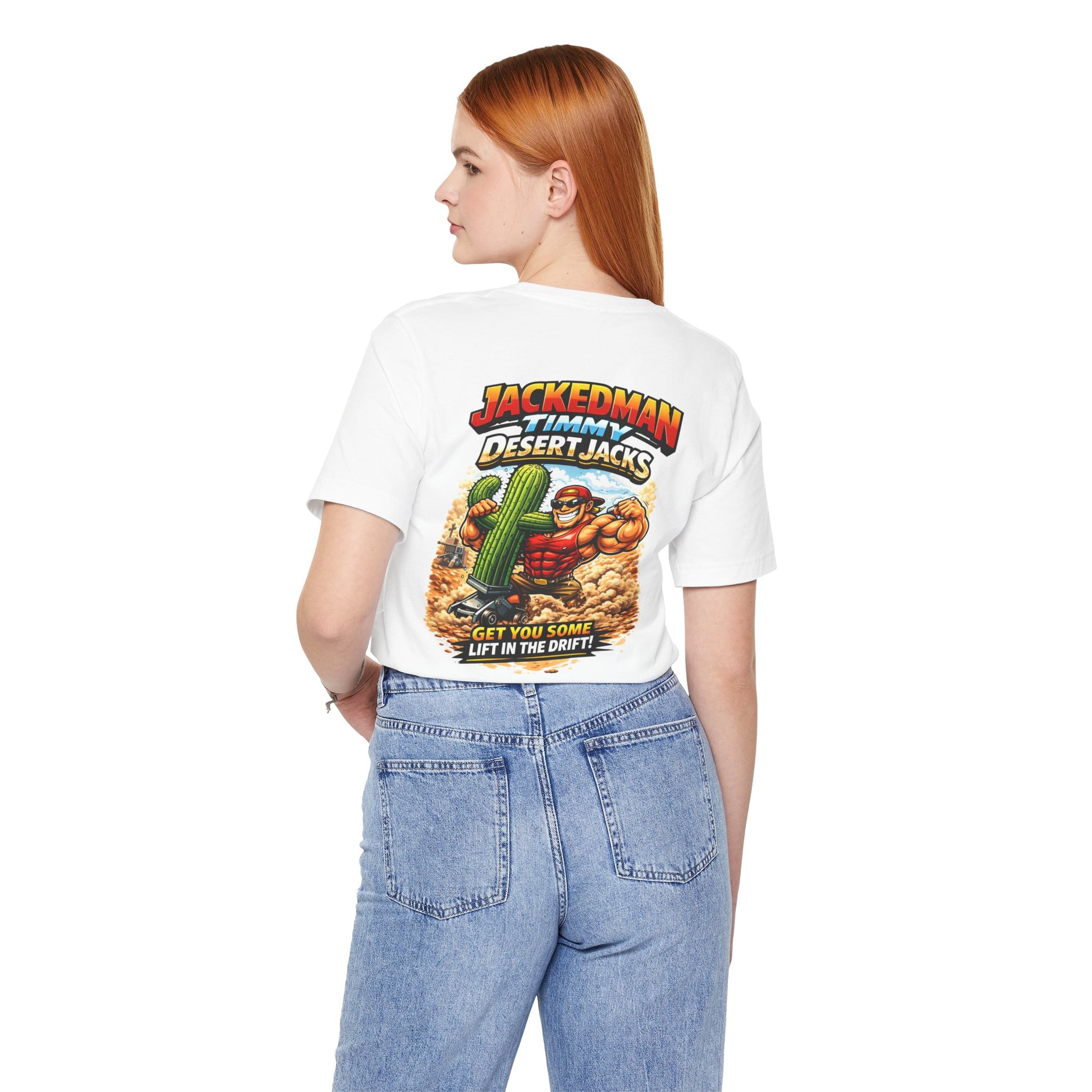Person wearing a white t-shirt with a graphic design and 'Jackedman Timmy Desert Jacks Get You Some Lift In The Drift' text on the back, standing against a plain background
