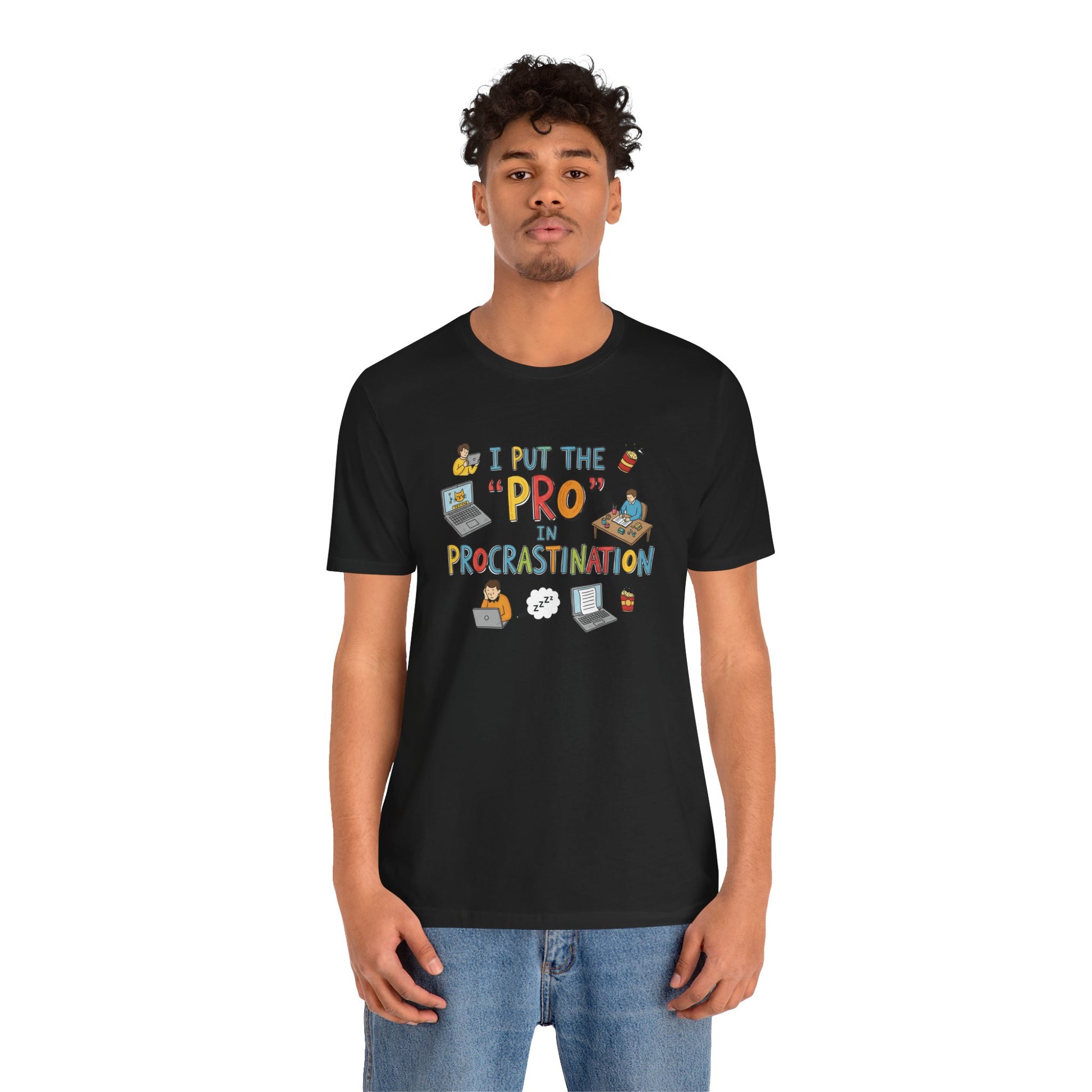 Person wearing a black t-shirt with colorful text and graphics on a white background