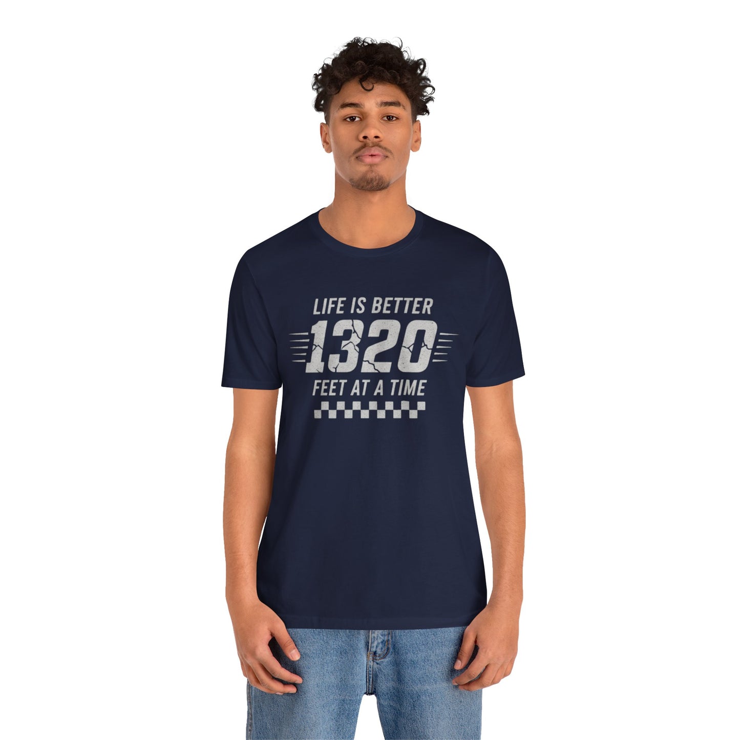Person wearing a navy blue t-shirt with text 'Life is better 1320 feet at a time' on a white background