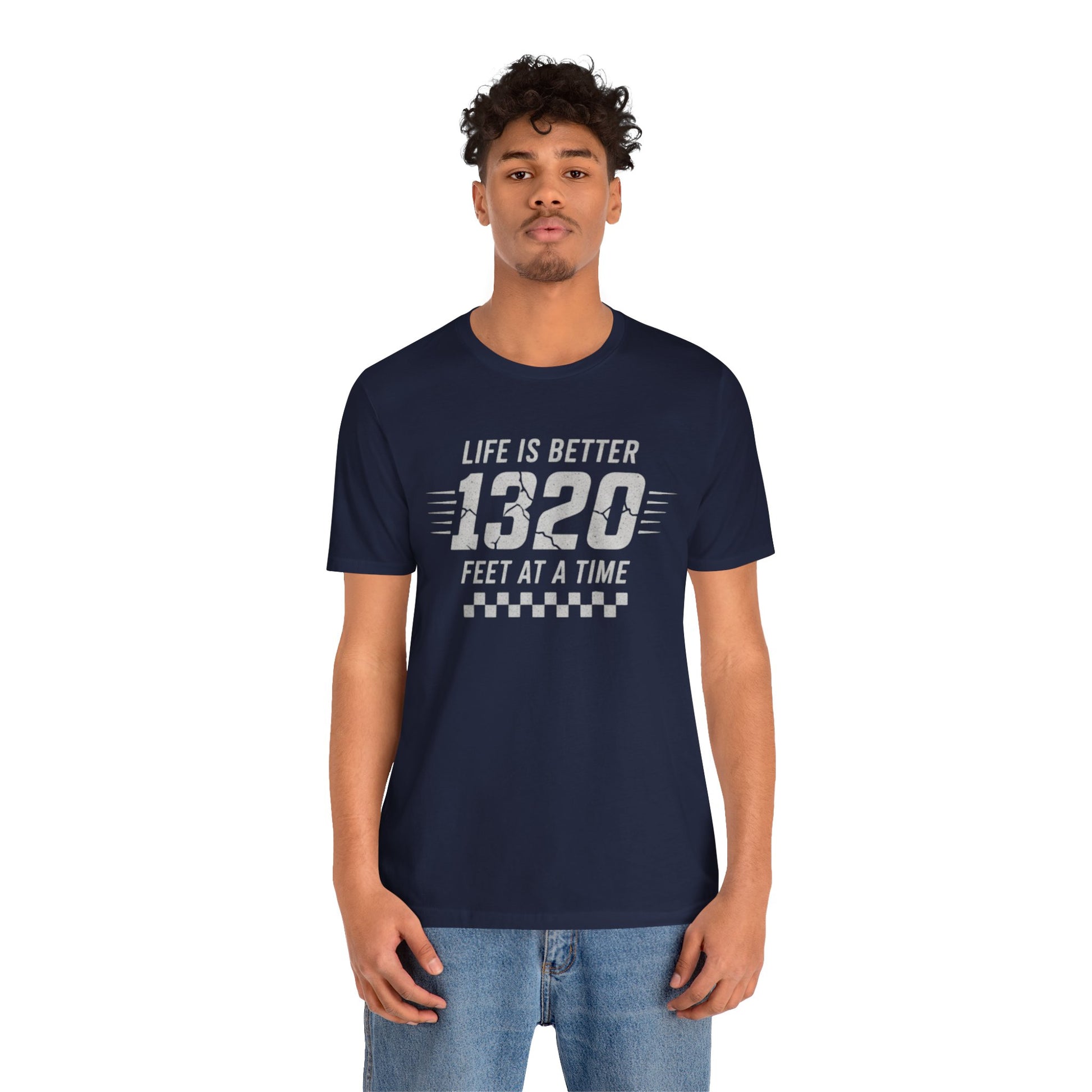 Person wearing a navy blue t-shirt with text 'Life is better 1320 feet at a time' on a white background