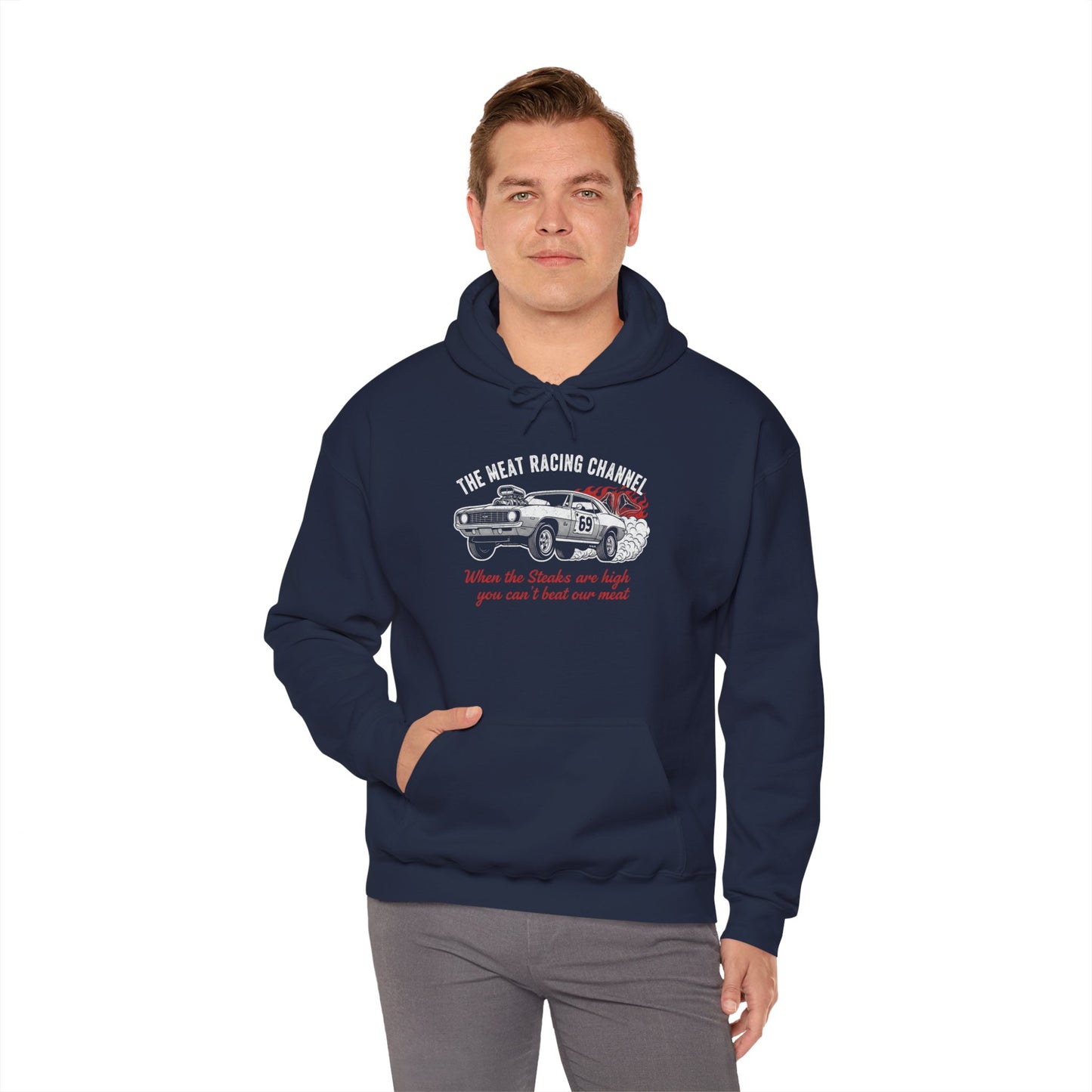 Man wearing a navy blue hoodie with a graphic design 'The Meat Racing Channel When the Steaks are high you can't beat our meat' on a white background