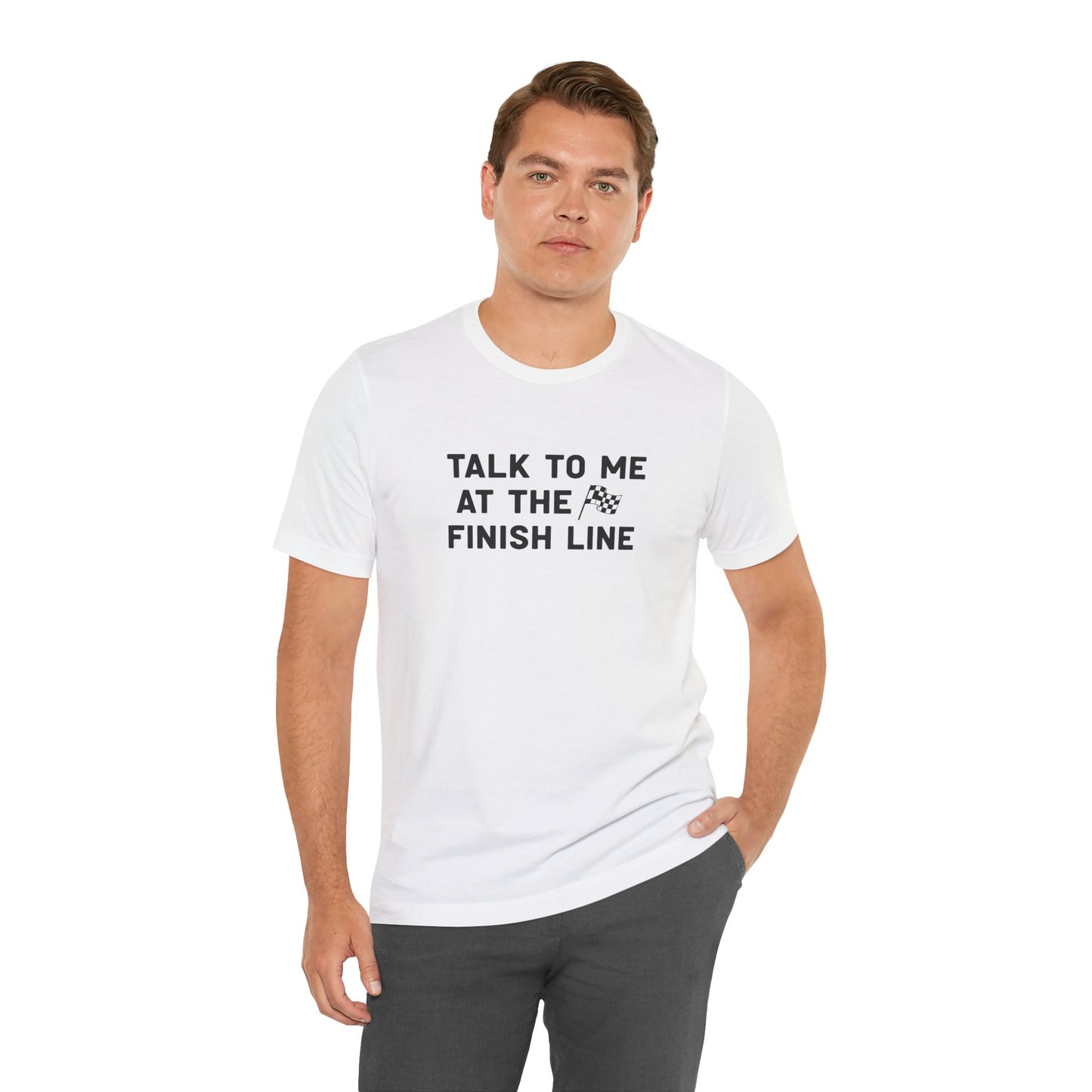 Man wearing a white t-shirt with text 'Talk to me at the finish line' on a white background