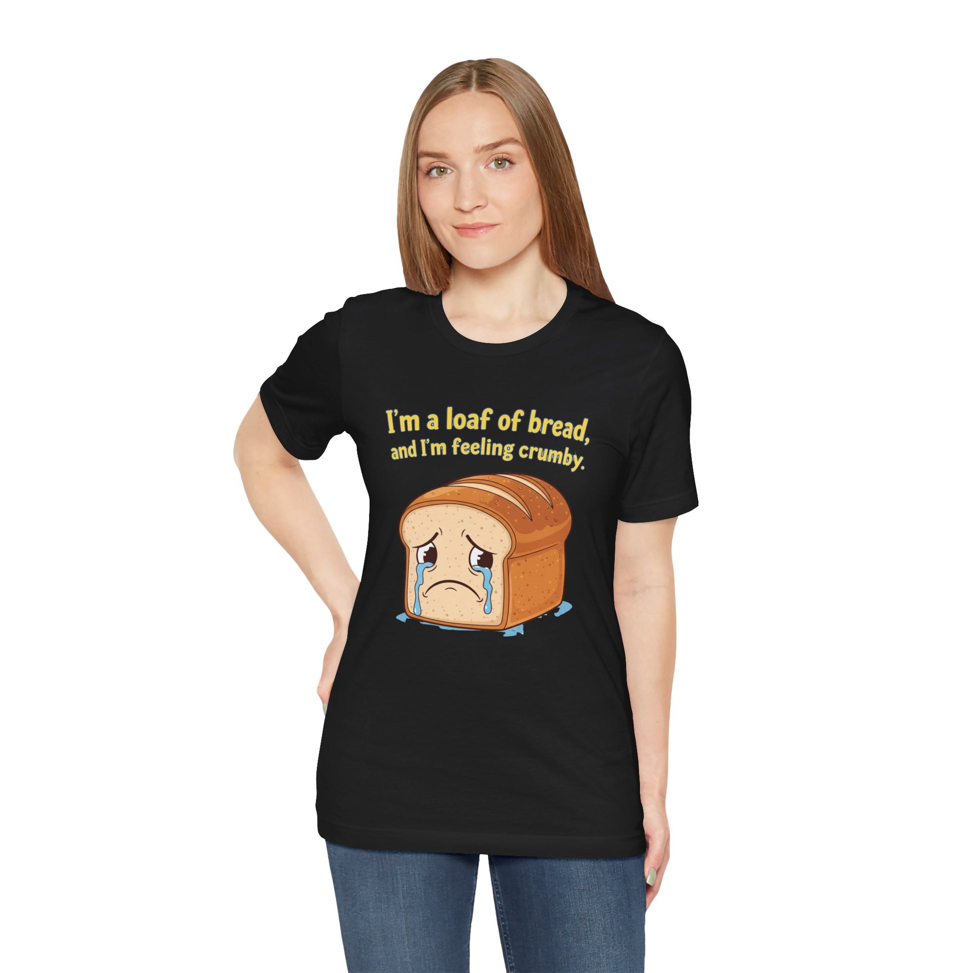 Woman wearing a black t-shirt with a bread graphic and text on a white background. The text says, "I'm a loaf of bread, and I'm feeling crumby."