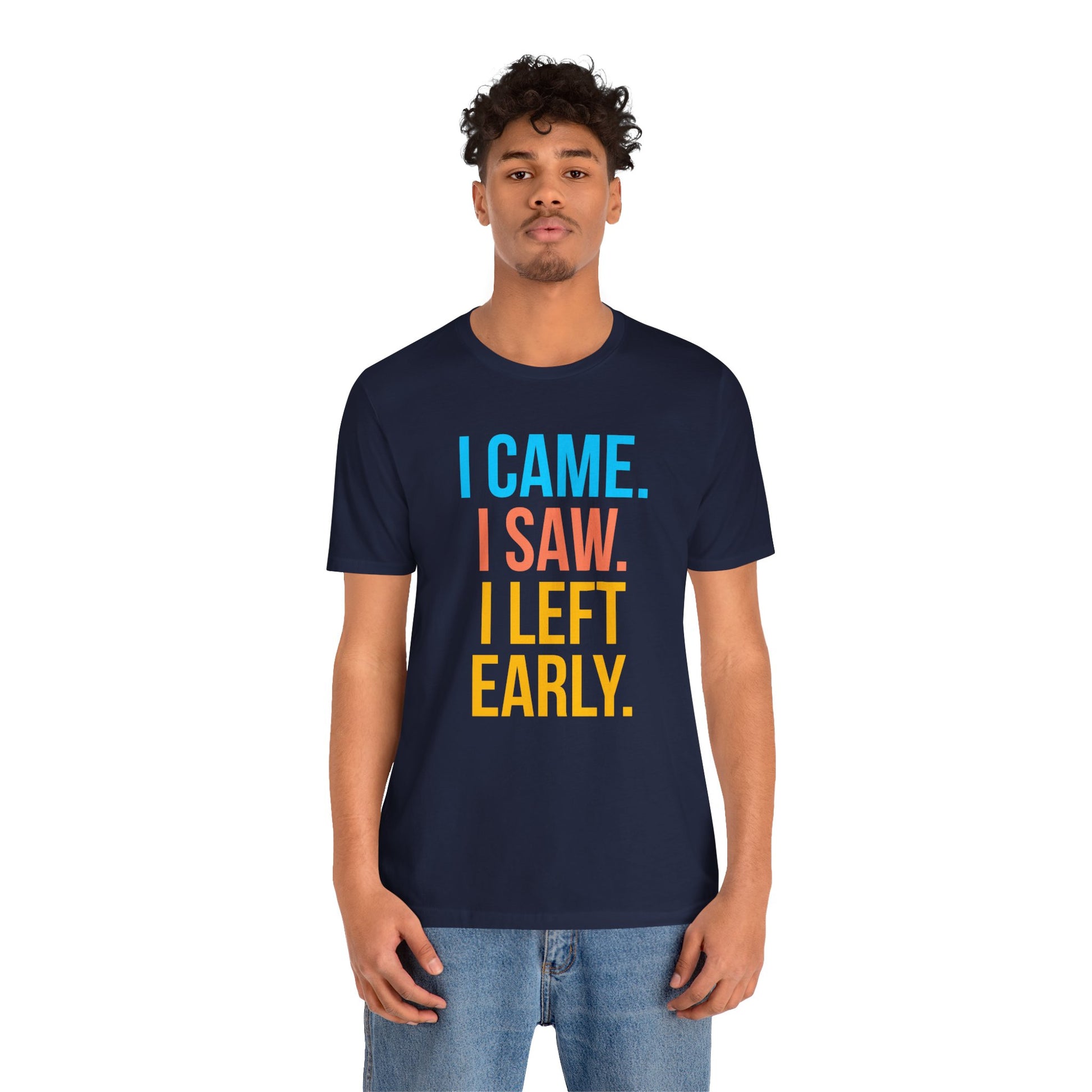 Person wearing a navy blue t-shirt with colorful text 'I came. I saw. I left early.' on a white background