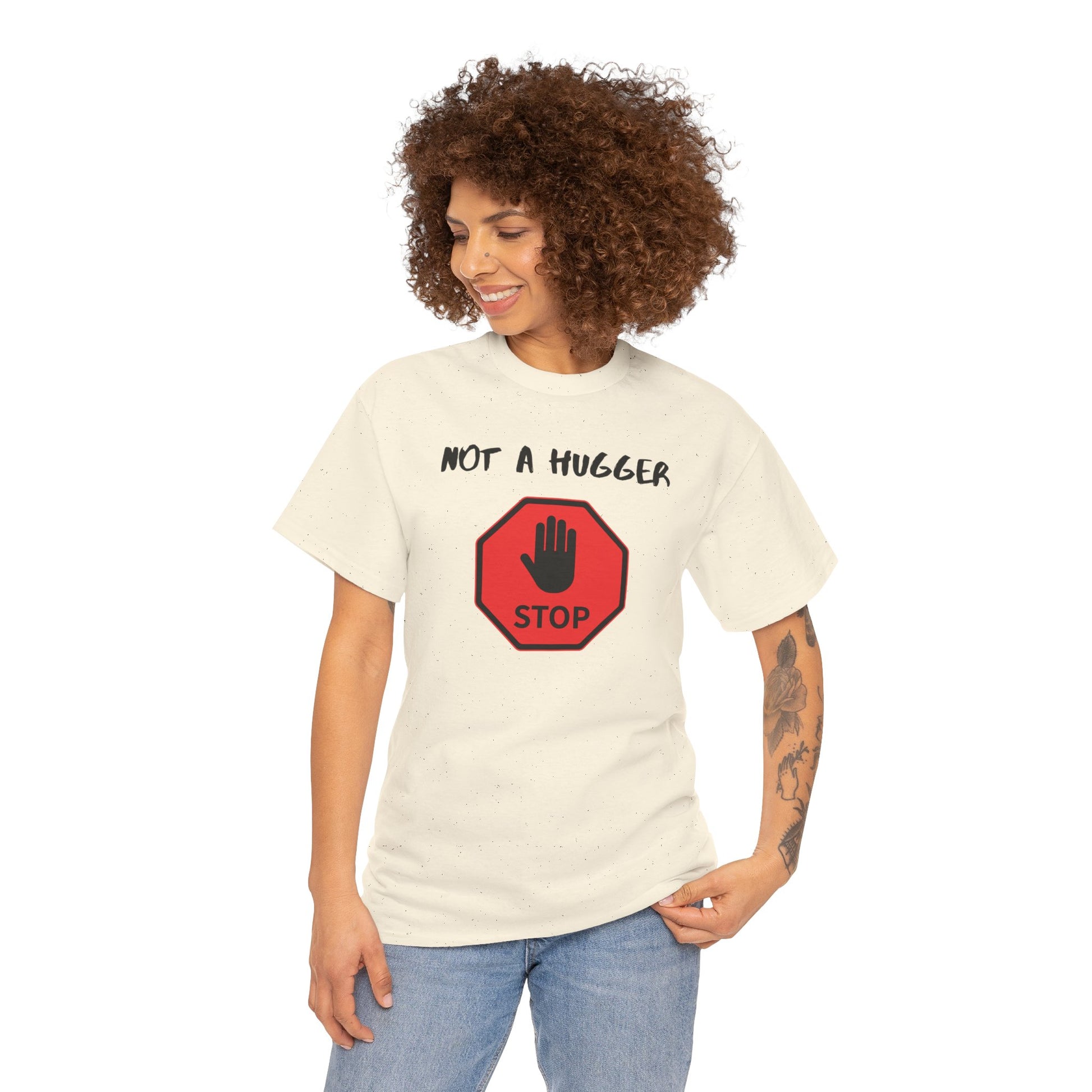 Woman wearing a t-shirt with 'Not a Hugger' design on a white background