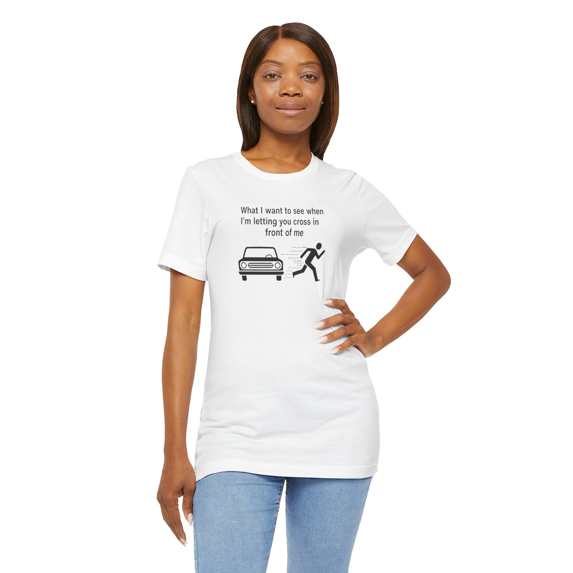 Woman wearing a white t-shirt with a graphic and text 'What I want to see when I'm letting you cross in front of me' on a white background