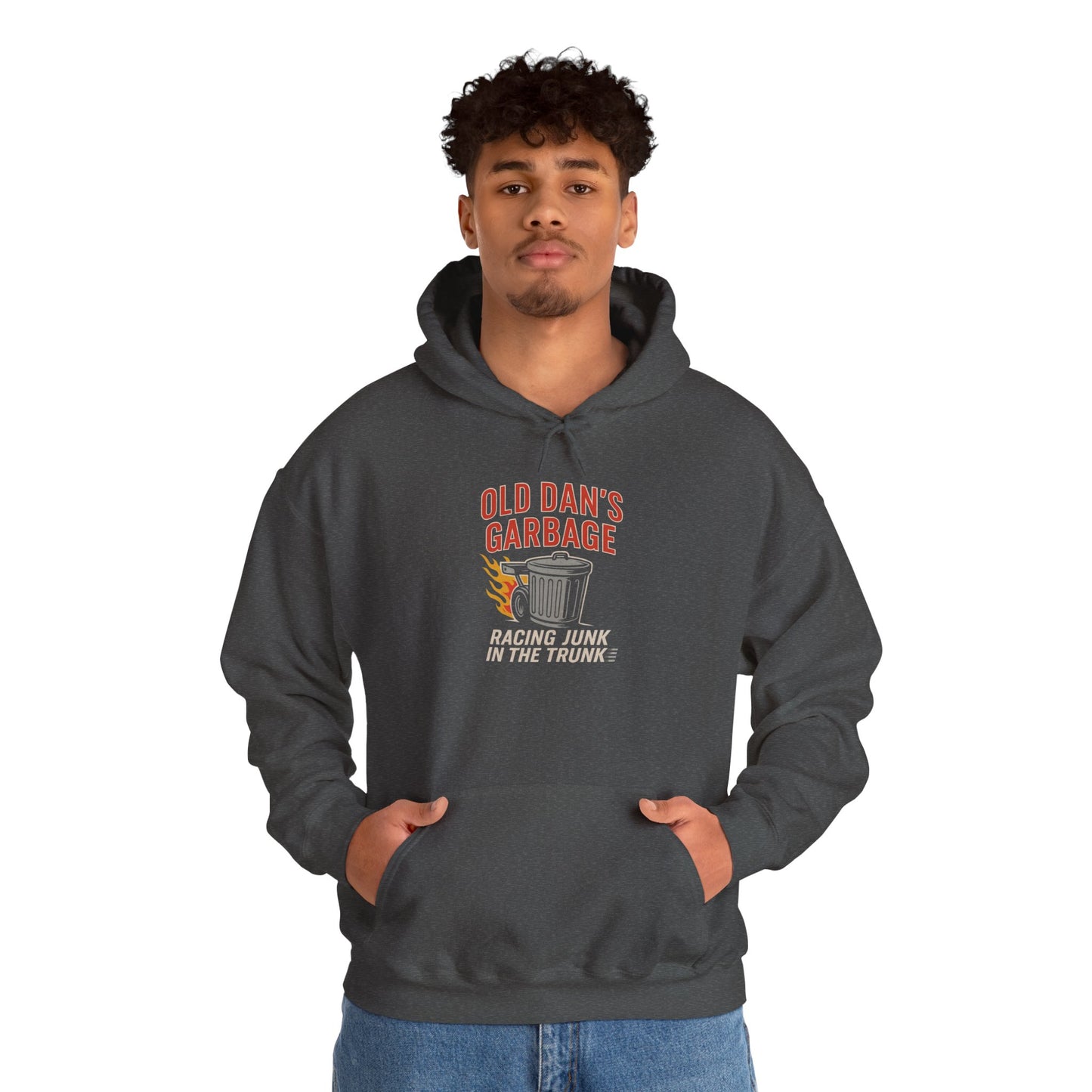 Person wearing a dark gray hoodie with Old Dan's Garbage Racing Junk In The Trunk graphic design on a white background