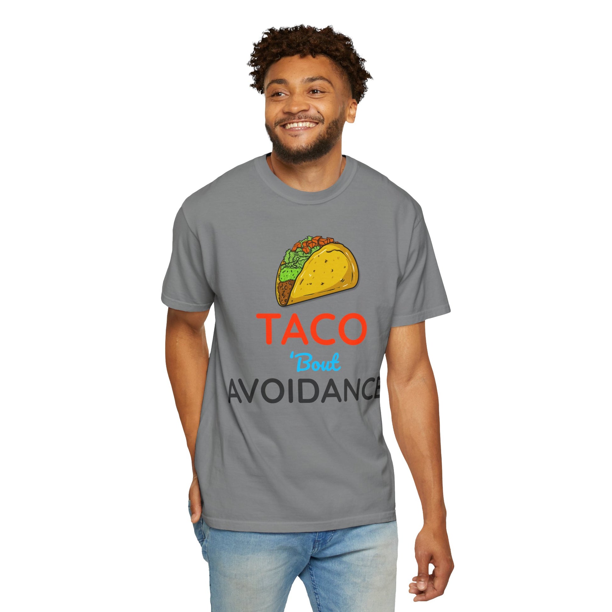 Man wearing a gray t-shirt with a taco graphic and text 'Taco 'bout avoidance' on a white background