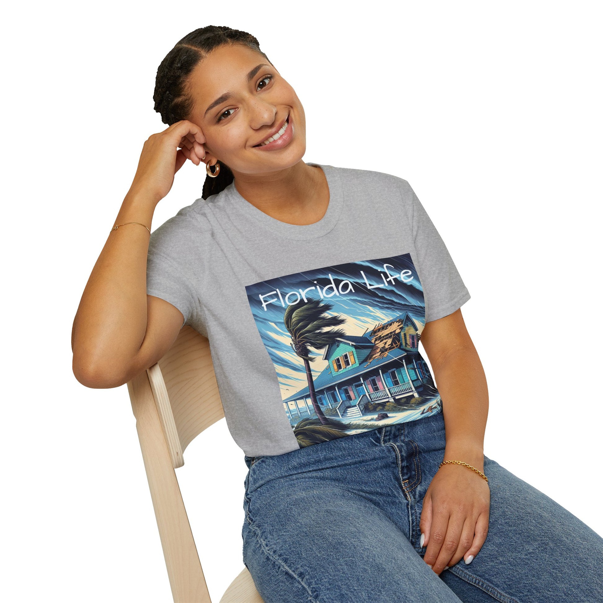 Woman wearing a 'Florida Life' t-shirt with a beach house design.