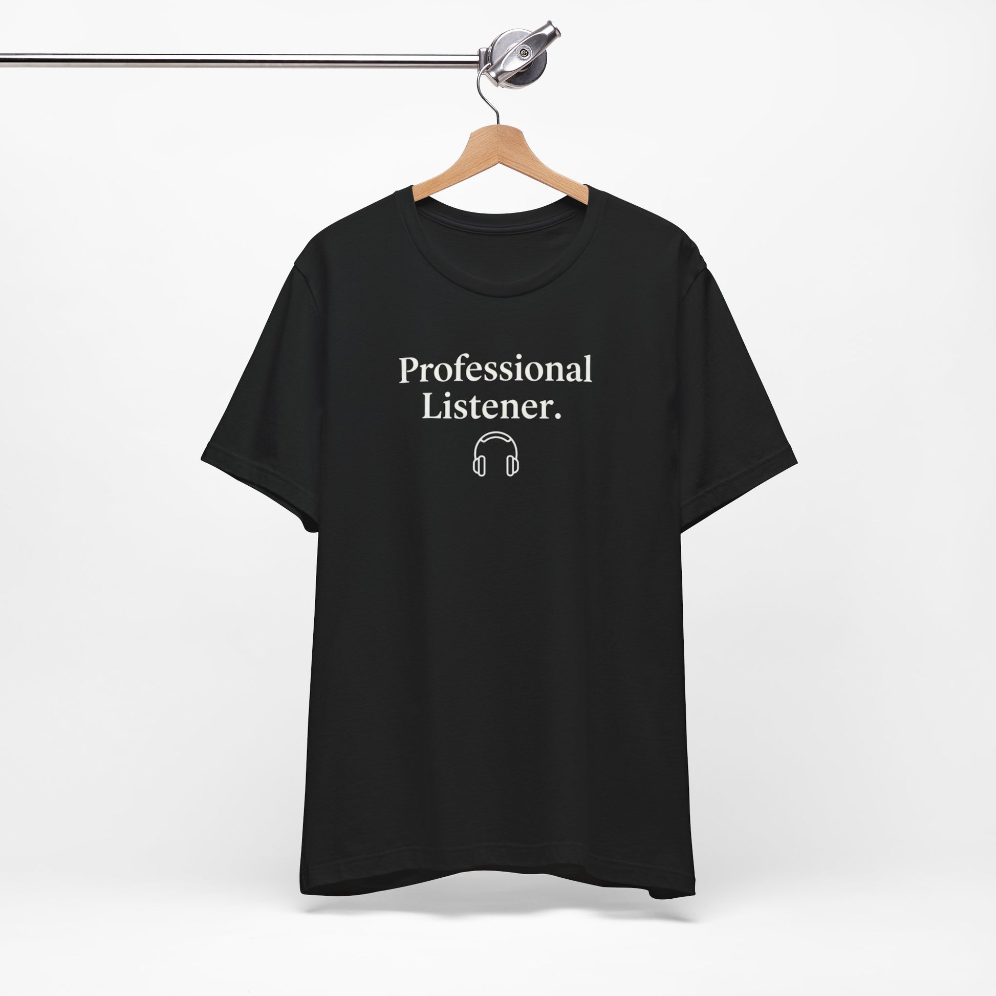 Black t-shirt with 'Professional Listener' text on a hanger against a white background