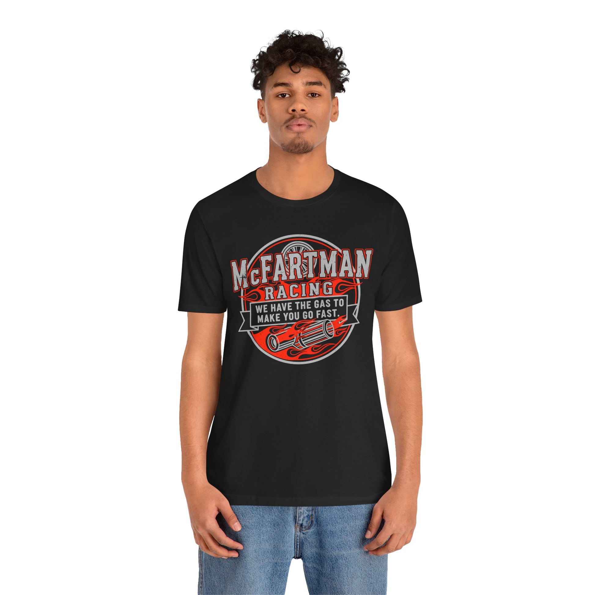 Person wearing a black t-shirt with 'McFartman Racing' graphic design on a white background