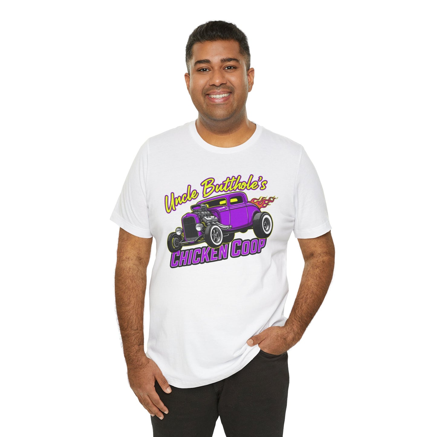 Man wearing a white t-shirt with a graphic design of a purple car and text 'Uncle Butthole's Chicken Coop' on a white background
