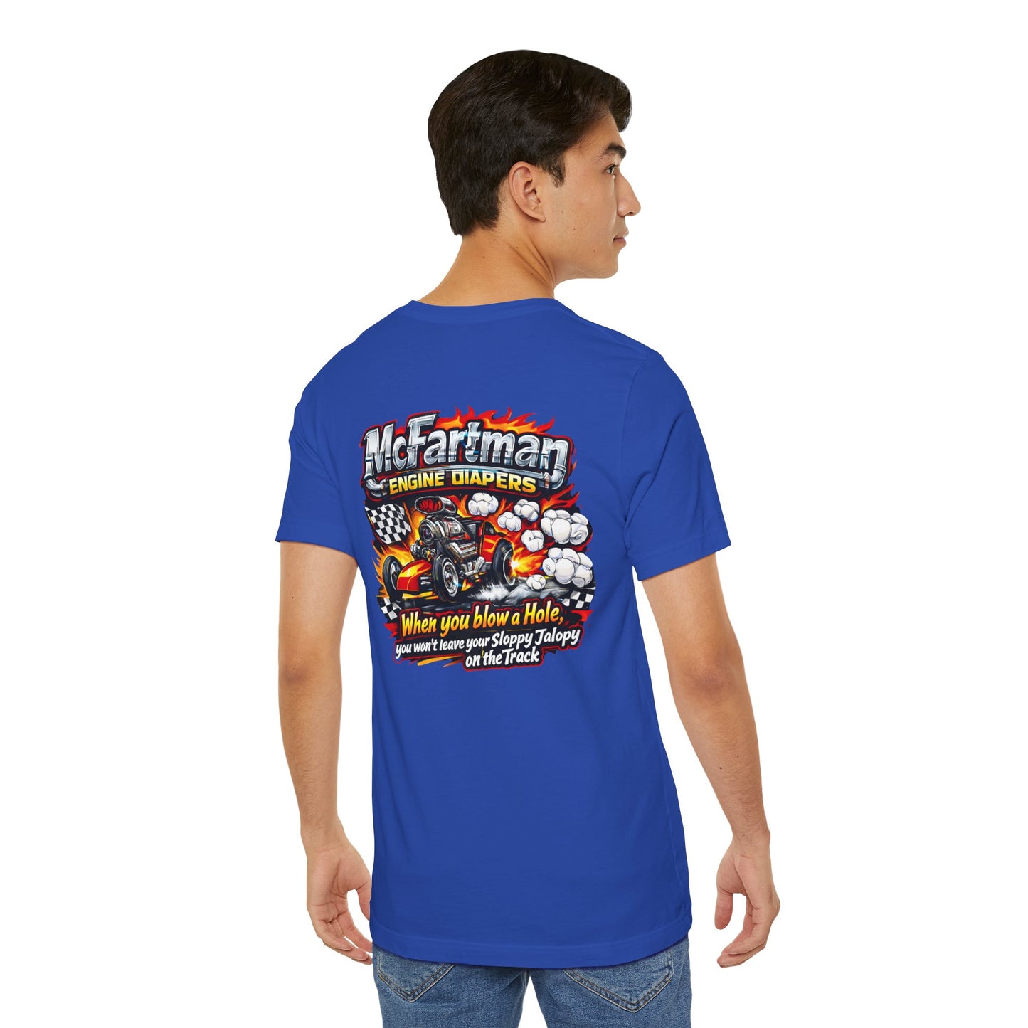 Person wearing a blue t-shirt with a graphic design and 'McFartman Engine Diapers When you blow a Hole, you won't leave your Sloppy Jalopy on the Track' text on the back, standing against a white background