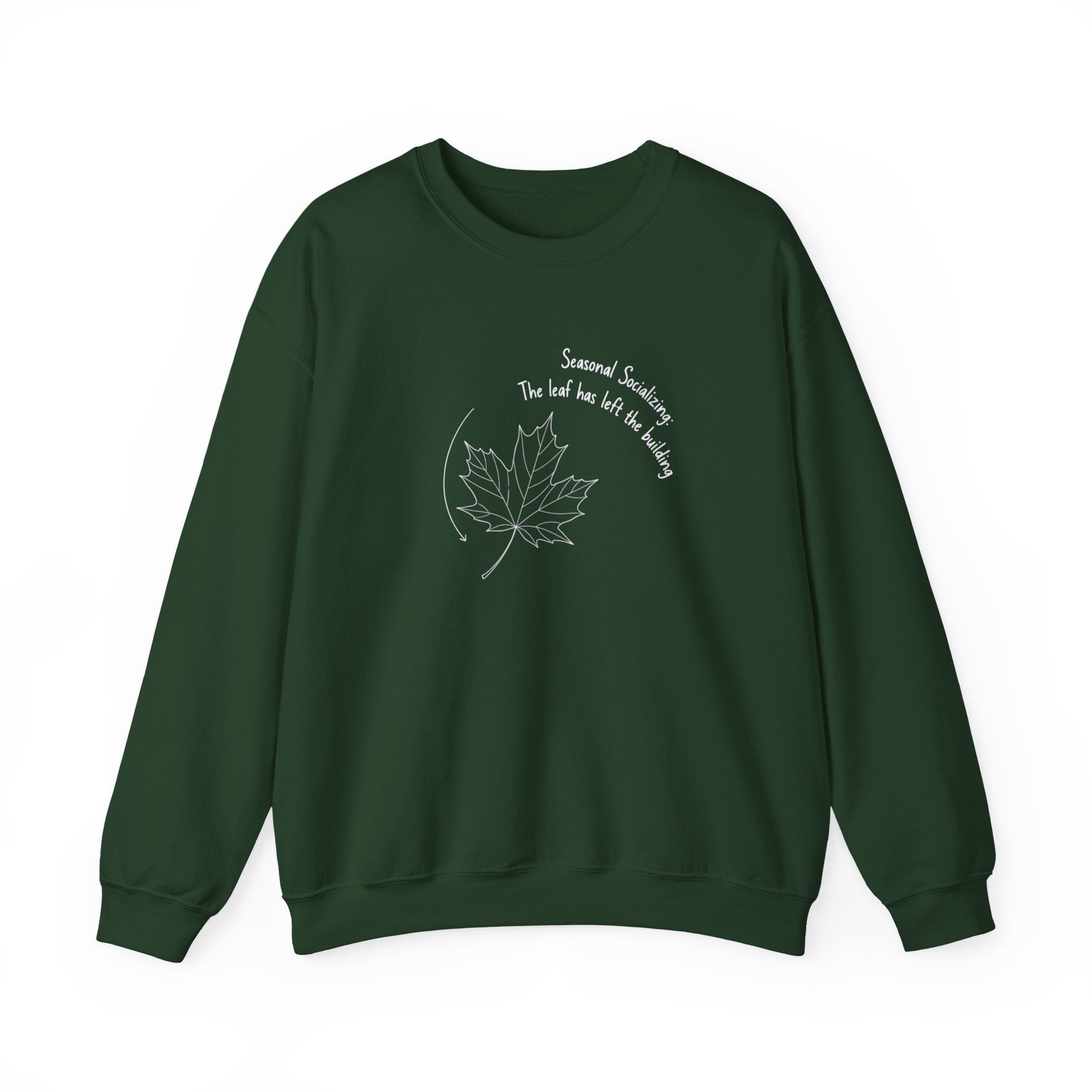 Green sweatshirt with a leaf design and text 'Seasonal Socializing, The leaf has left the building' on a white background