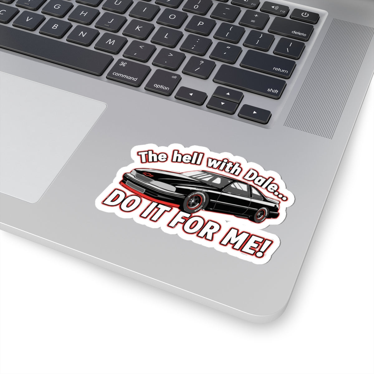 Sticker with a car graphic and text 'The hell with Dale Do it for me' on a laptop