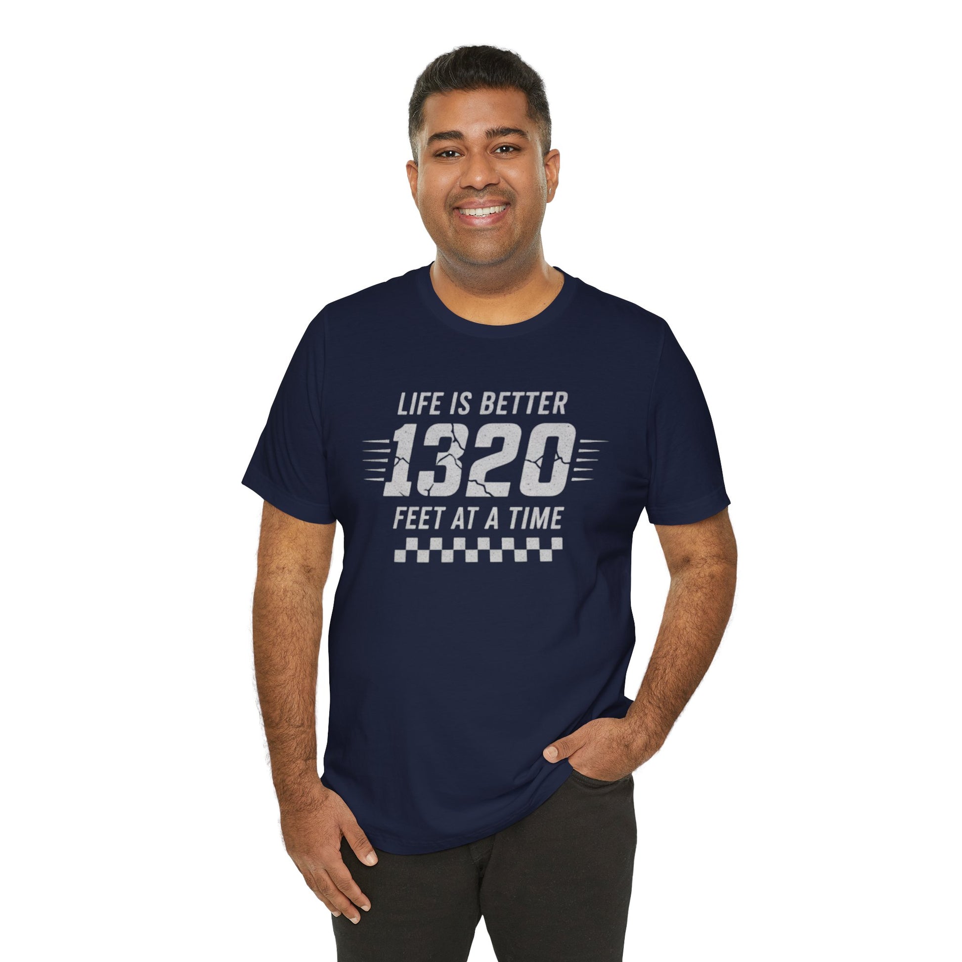 Man wearing a navy blue t-shirt with text 'Life is better 1320 feet at a time' on a white background