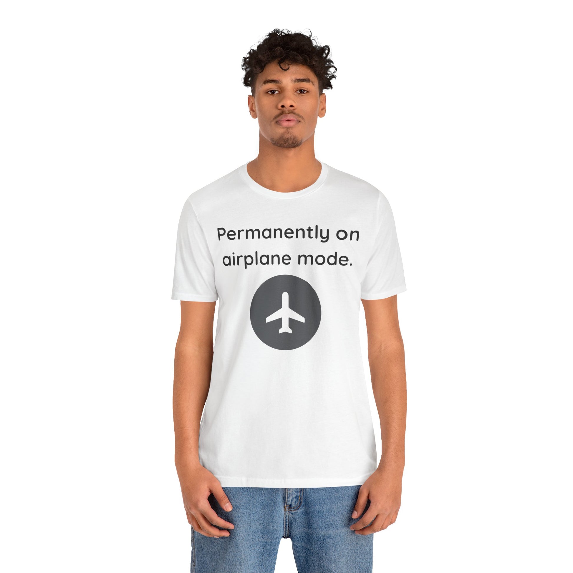 Person wearing a white t-shirt with 'Permanently on airplane mode' text and airplane icon.