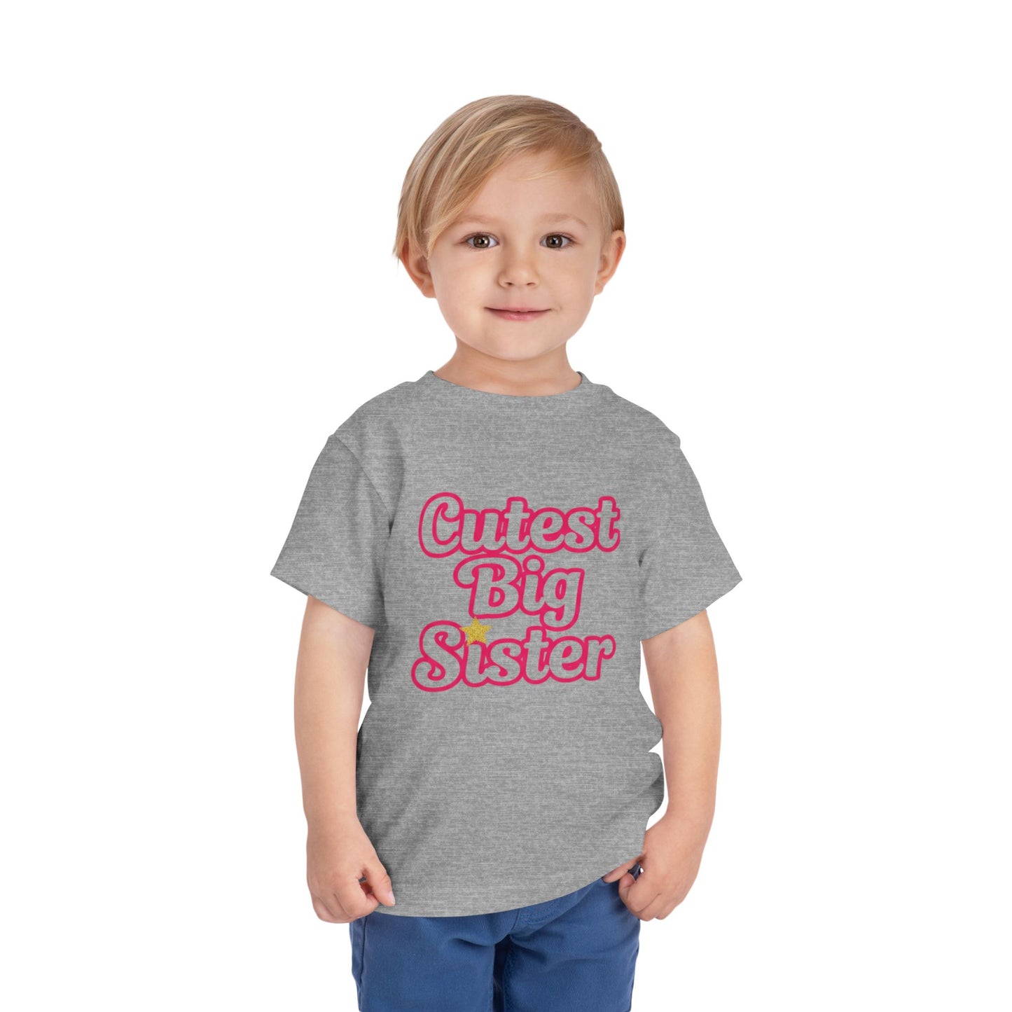 Child wearing a gray t-shirt with 'Cutest Big Sister' text on a white background