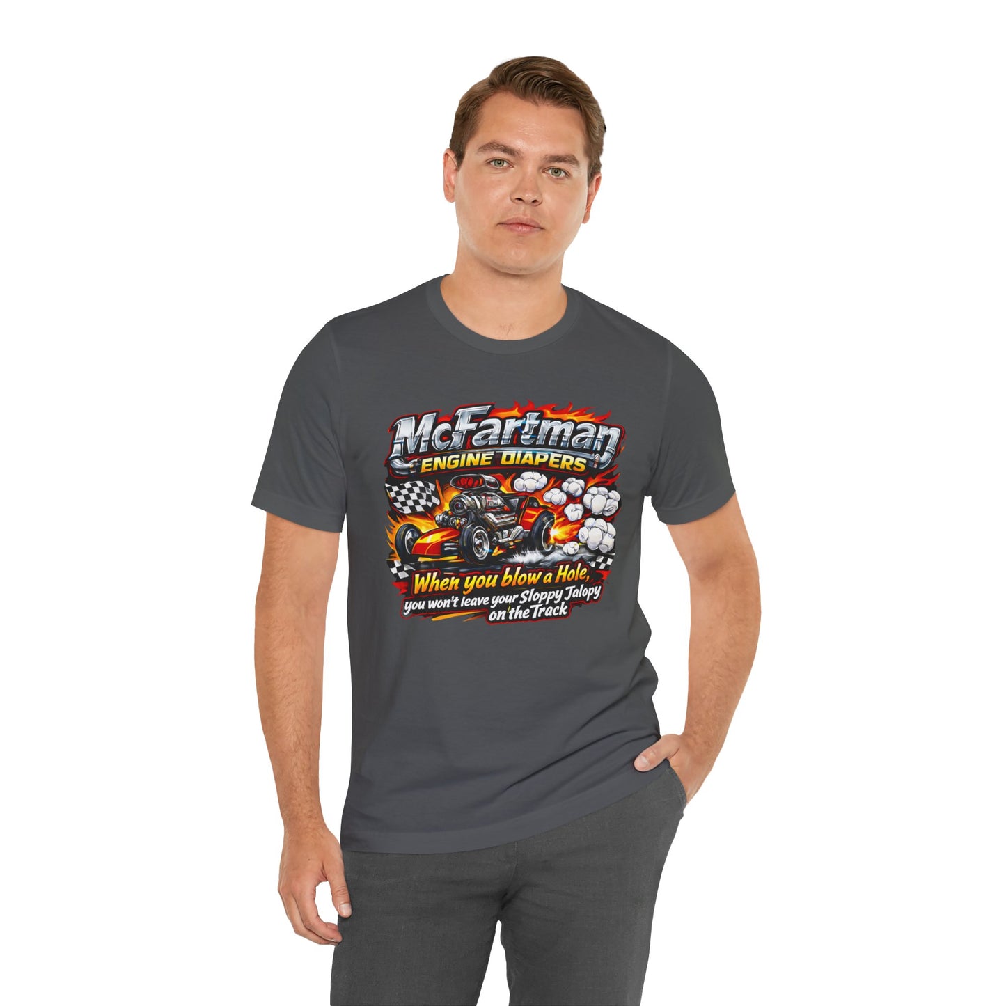 Man wearing a dark gray t-shirt with a graphic design and 'McFartman Engine Diapers When you blow a Hole, you won't leave your Sloppy Jalopy on the Track' text.