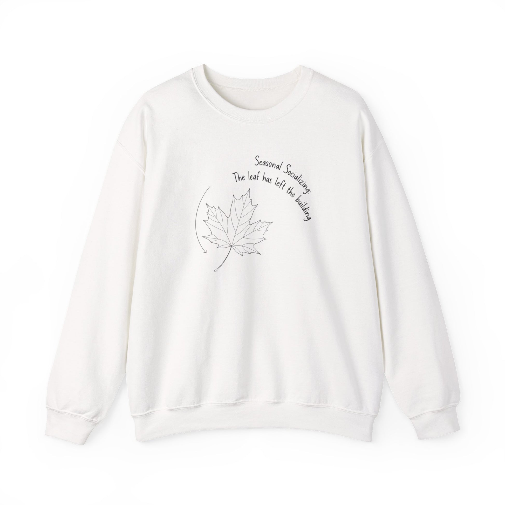 White sweatshirt with a leaf design and text 'Seasonal Socializing, The leaf has left the building' on a white background