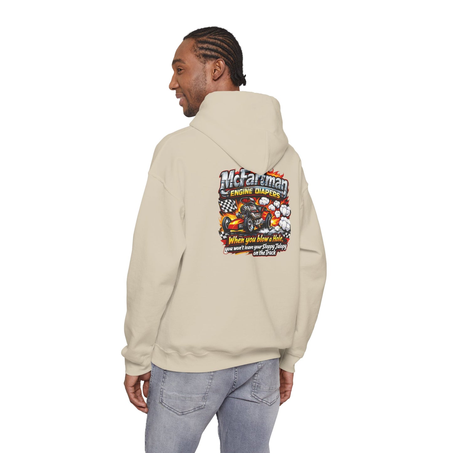 Person wearing a beige Gildan 18500 hoodie with a colorful graphic and  'McFartman Engine Diapers When You Blow a Hole You Won't Leave Your Sloppy Jalopy On The Track' text on the back, standing against a white background