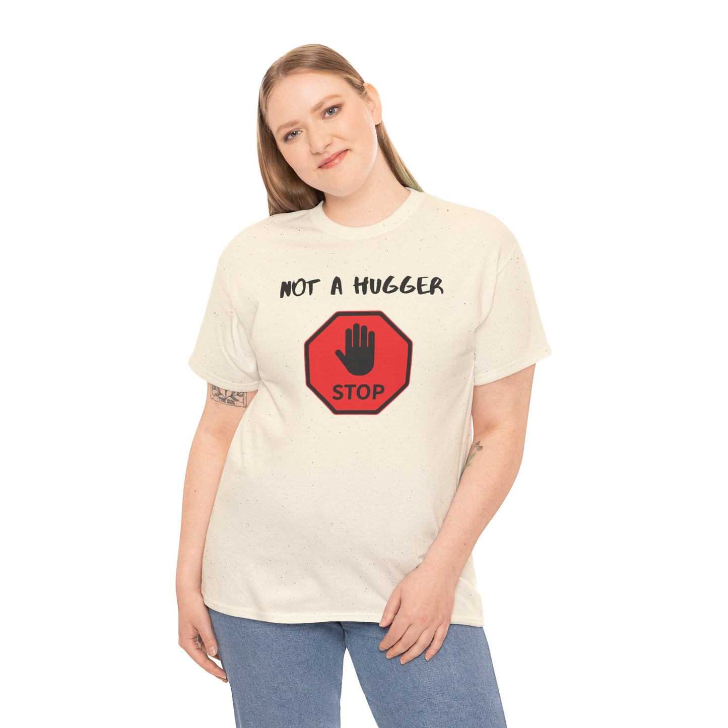Person wearing a cream t-shirt with 'Not a hugger' text and stop sign graphic on a white background