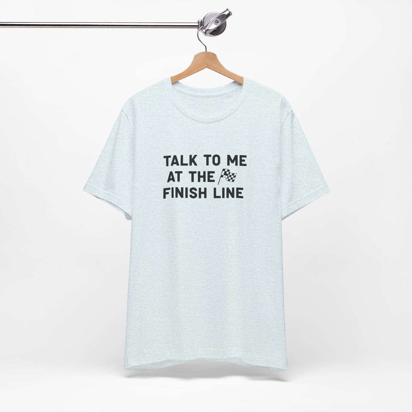 Light blue t-shirt with 'Talk to me at the finish line' text on a white background