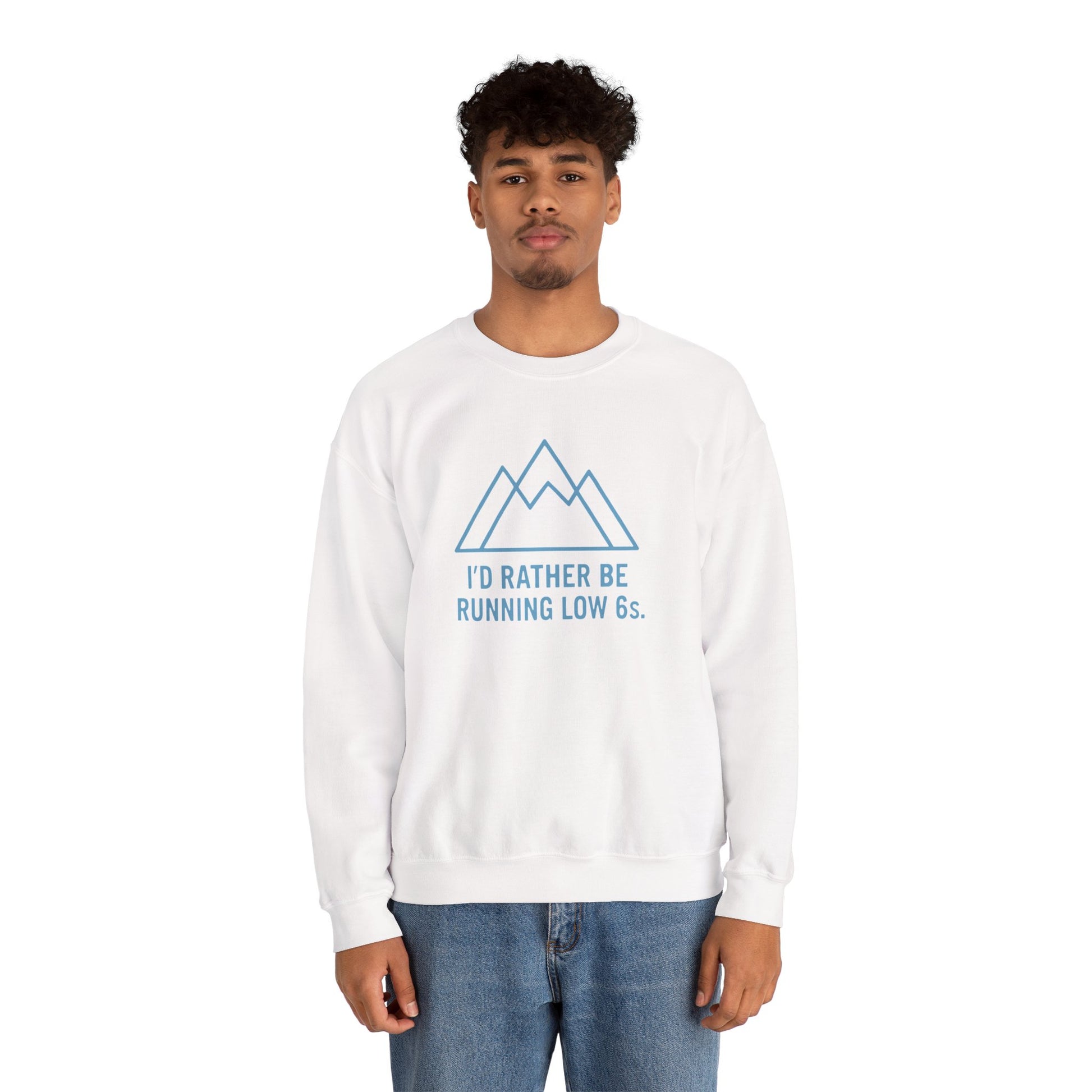 Person wearing a white sweatshirt with a mountain graphic and text 'I'd rather be running low 6s'on a white background