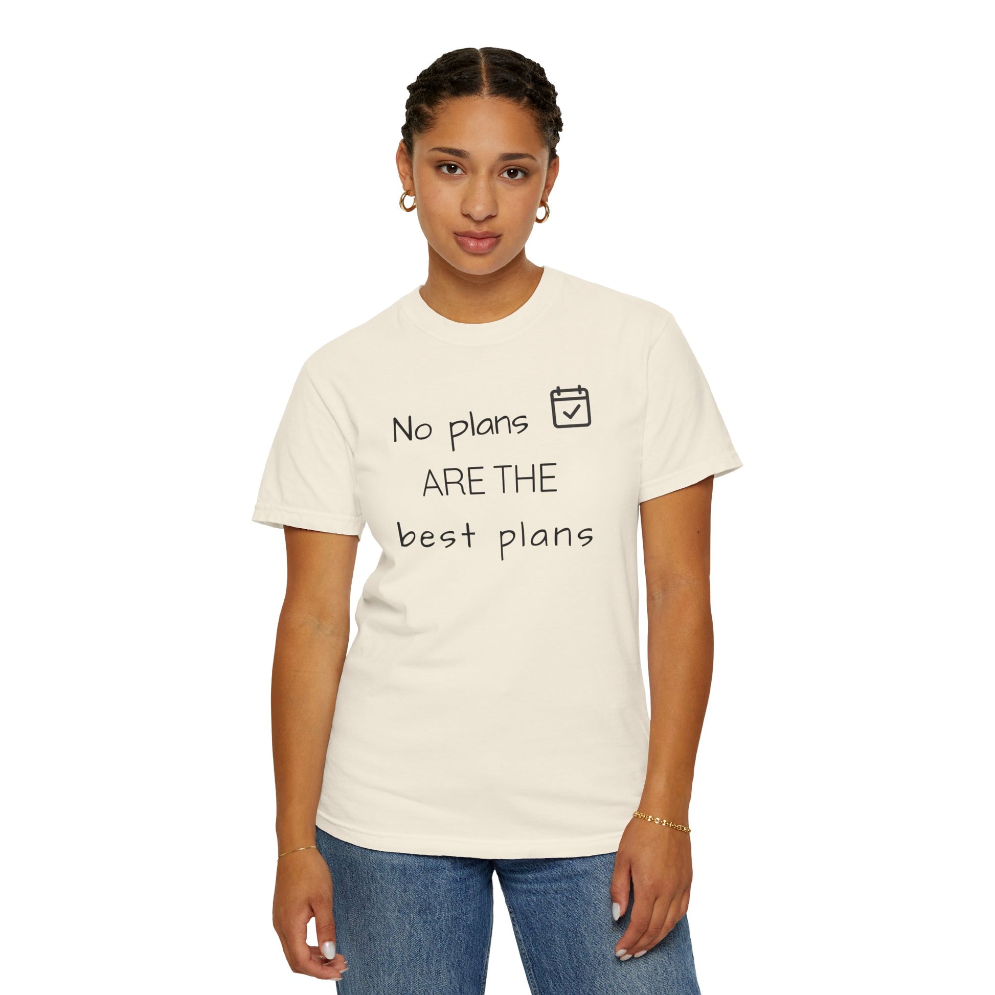 Person wearing a white t-shirt with text 'No plans ARE THE best plans' on a white background