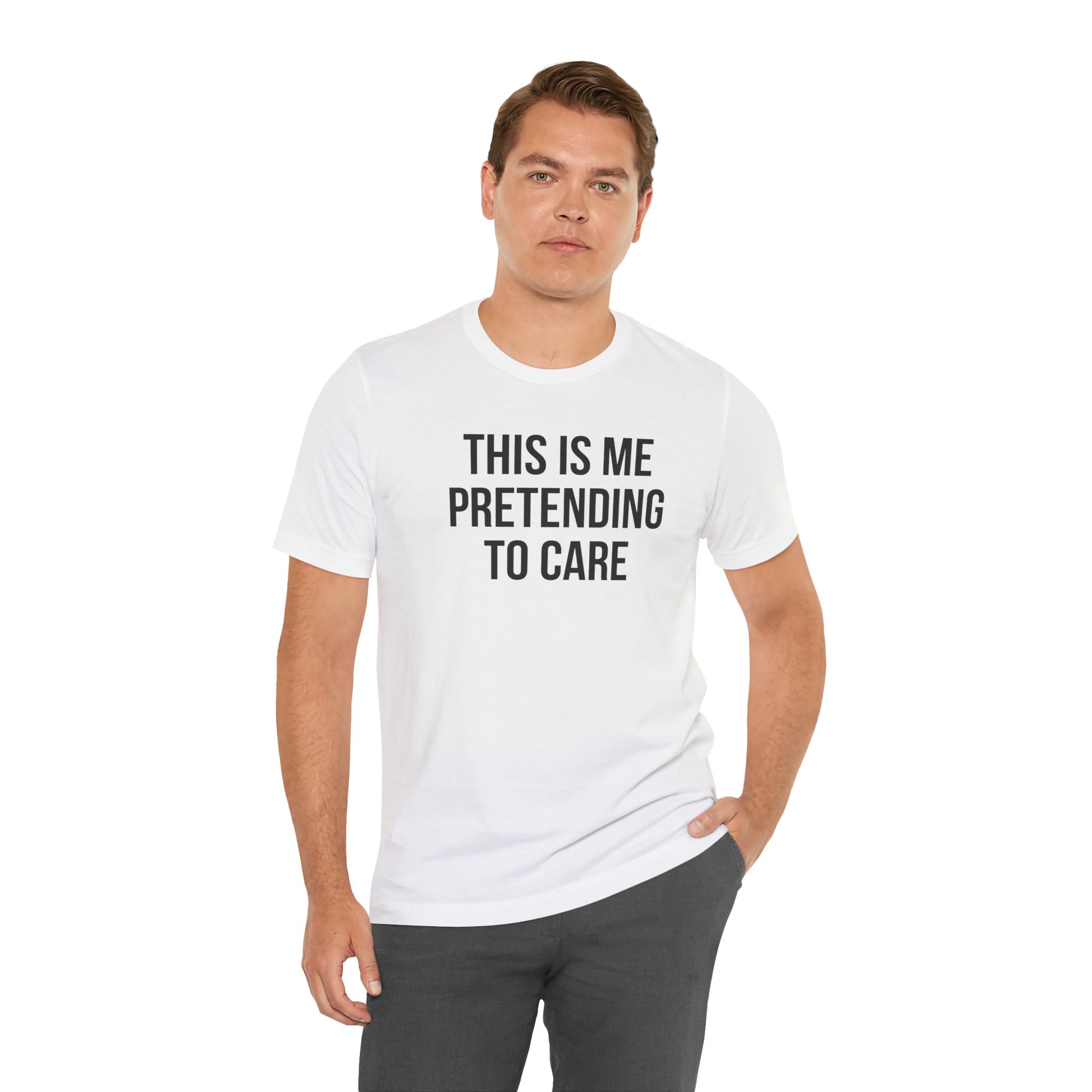Man wearing a white t-shirt with text 'This is me pretending to care' on a white background