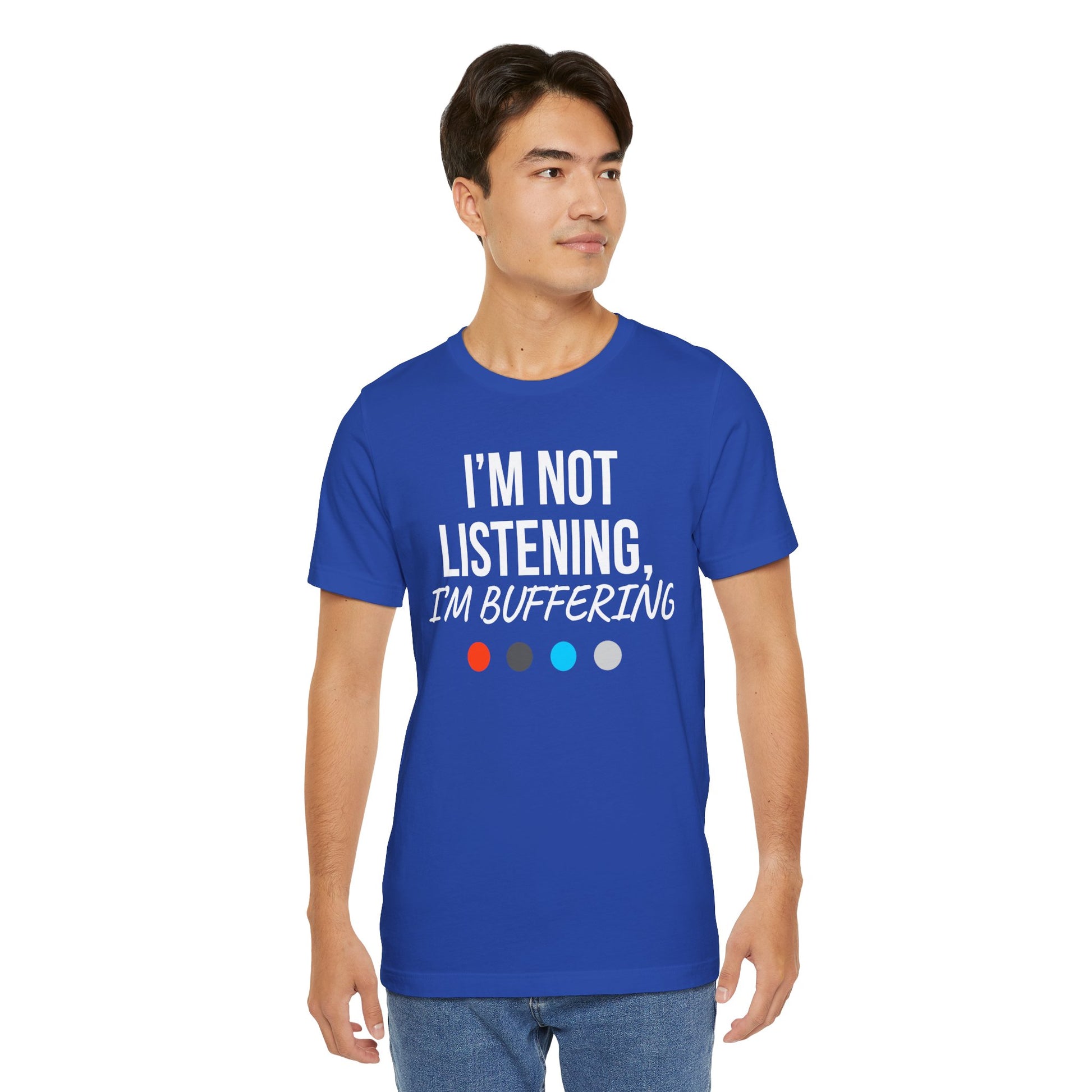 Man wearing a blue t-shirt with 'I'm not listening, I'm buffering' text on a white background