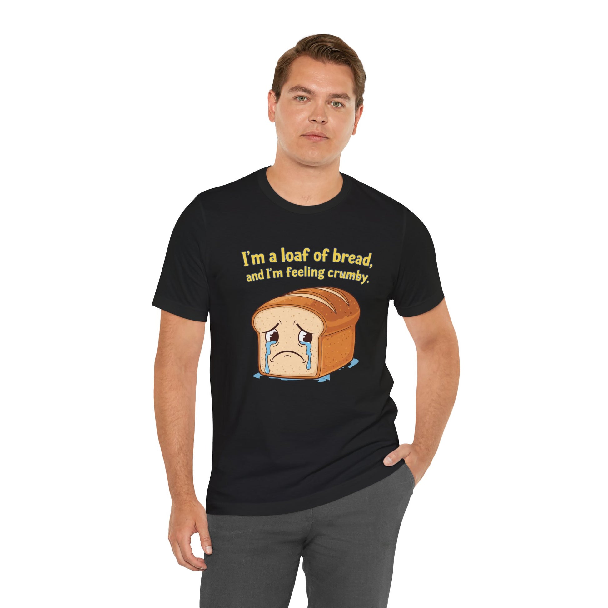 Man wearing a black t-shirt with a bread graphic and text on a white background. The text says, "I'm a loaf of bread, and I'm feeling crumby."