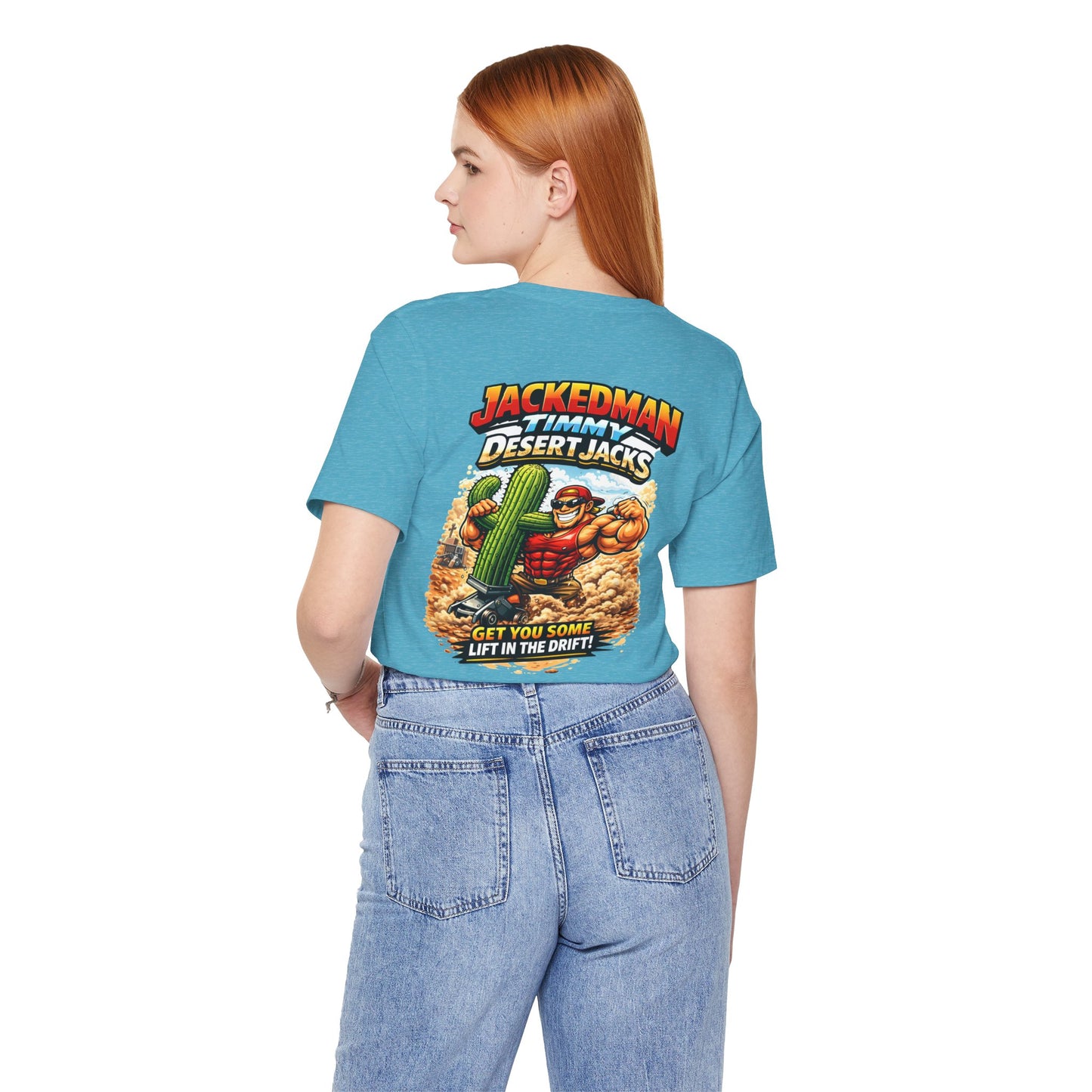 Person wearing a blue t-shirt with a graphic design and 'Jackedman Timmy Desert Jacks Get You Some Lift In The Drift' text on the back, standing against a white background