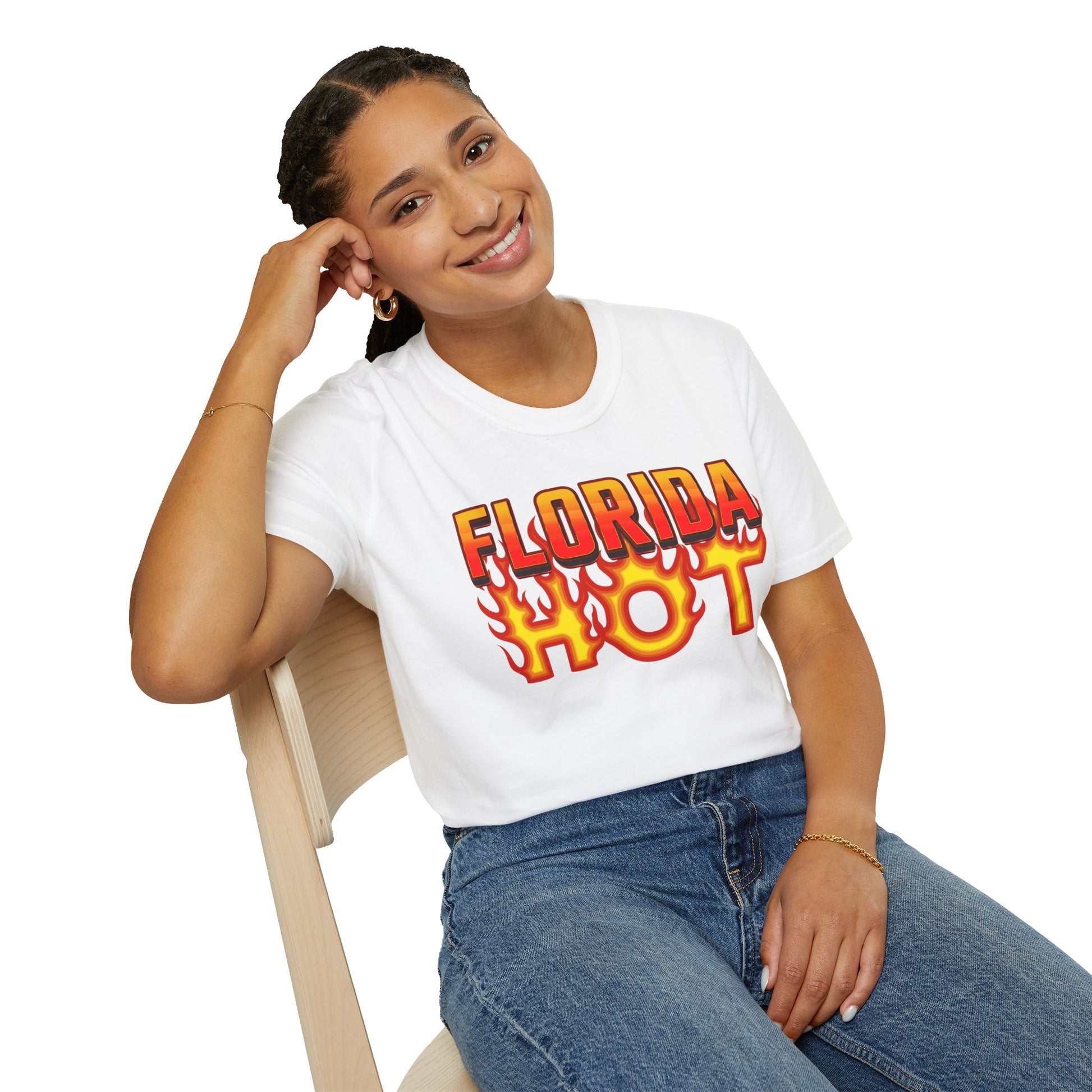 Person wearing a white t-shirt with 'Florida Hot' text, sitting on a chair.