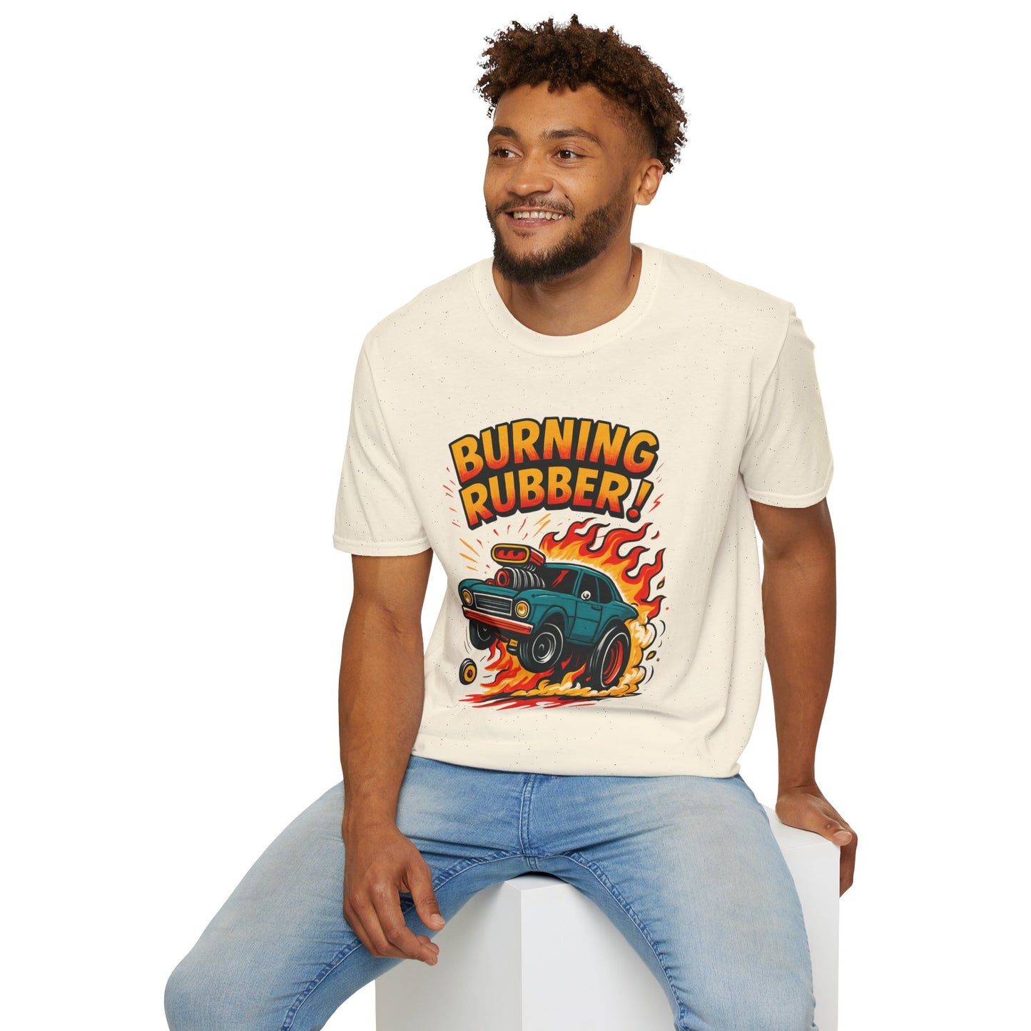 Man wearing a cream t-shirt with 'Burning Rubber!' graphic design on a white background
