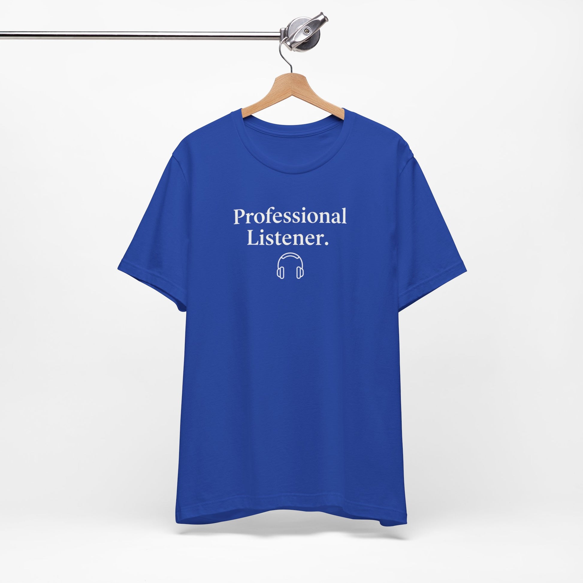 Blue t-shirt with 'Professional Listener' text on a hanger against a white background