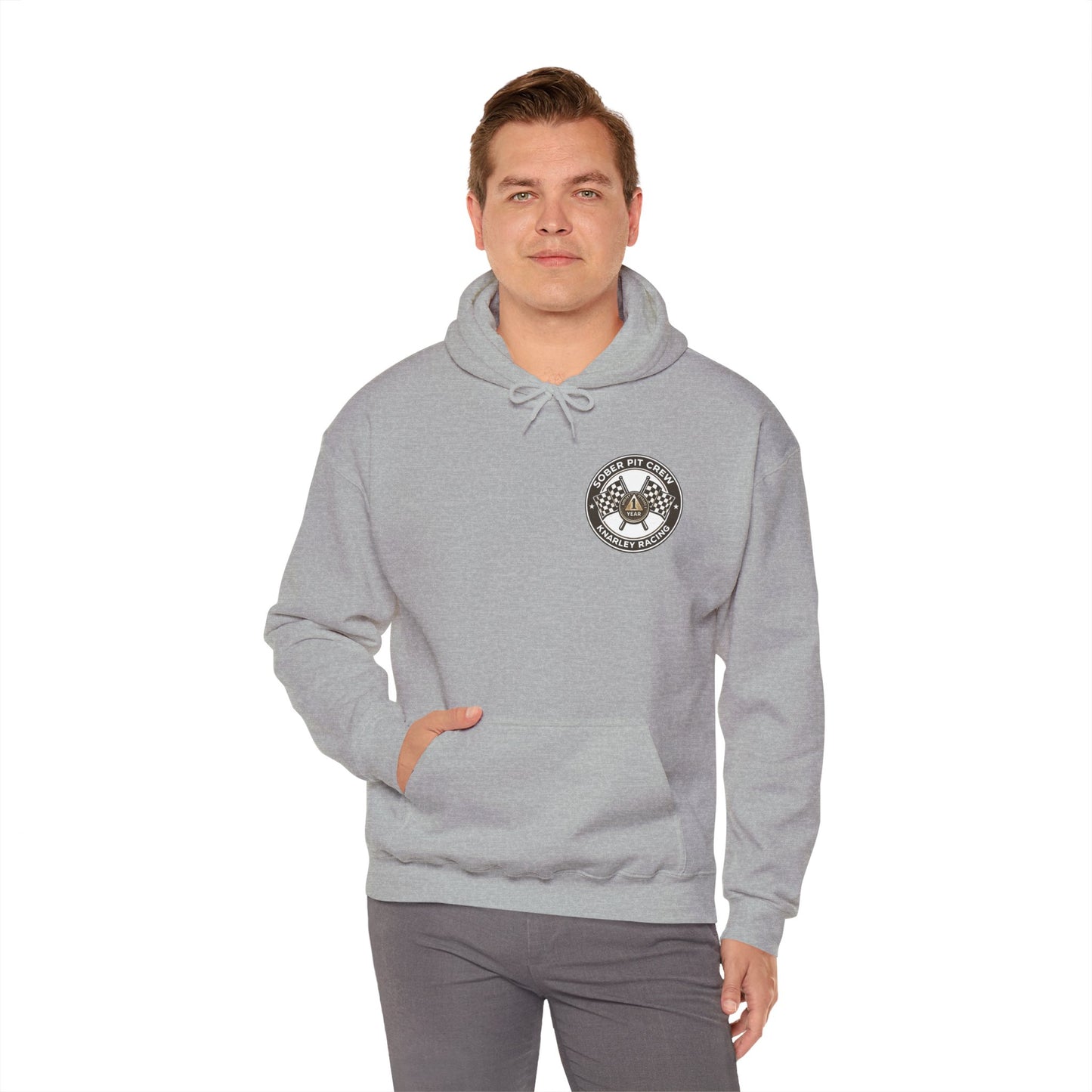 Man wearing a gray hoodie with a 'Sober Pit Crew Knarley Racing' logo on a white background