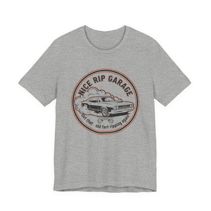 Gray t-shirt with a graphic design of a car and text 'Nice Rip Garage Get that old fart ripping again' on a white background