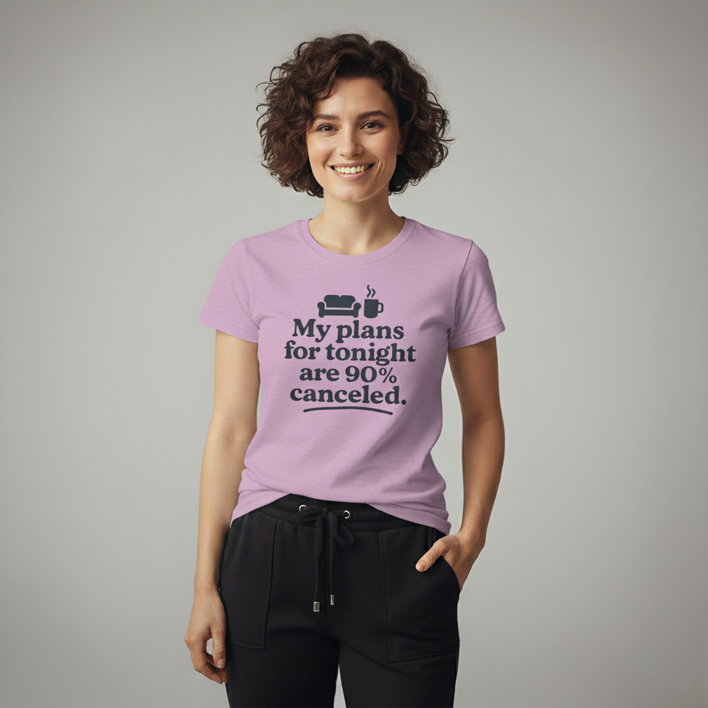 Woman wearing a purple t-shirt with text 'My plans for tonight are 90% canceled' on a plain background