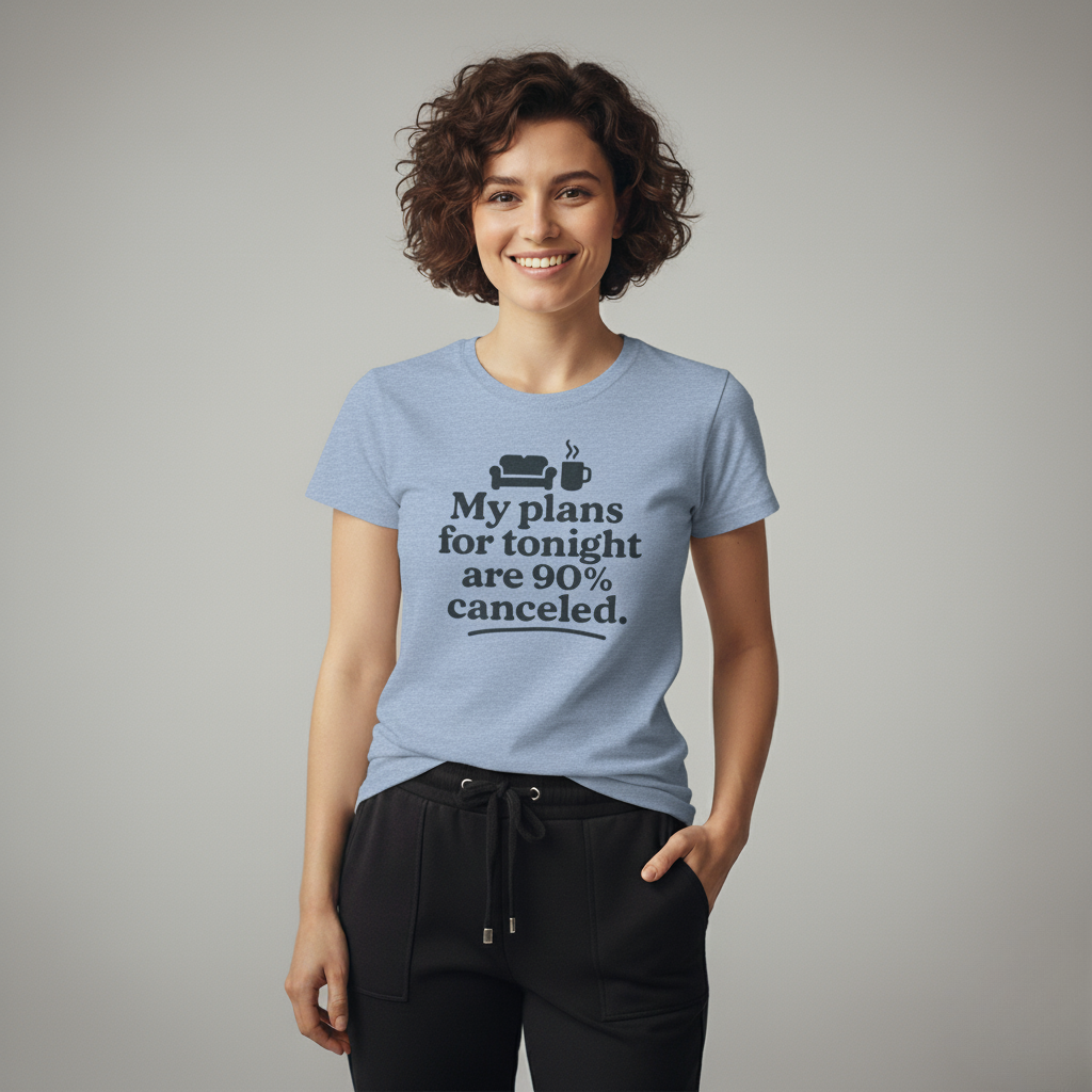 Woman wearing a light blue t-shirt with text 'My plans for tonight are 90% canceled' on a gray background