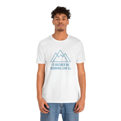 Person wearing a white t-shirt with a blue graphic and text 'I'd rather be running low 6s' on a white background