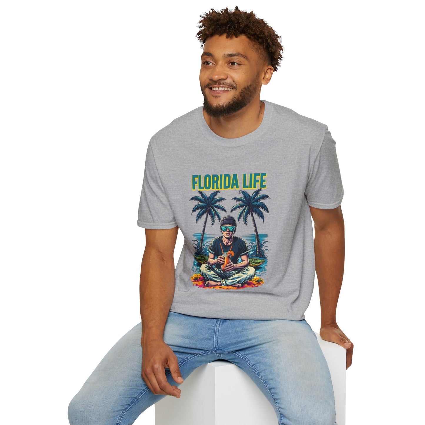 Man wearing a gray 'Florida Life' t-shirt with a graphic design on a white background